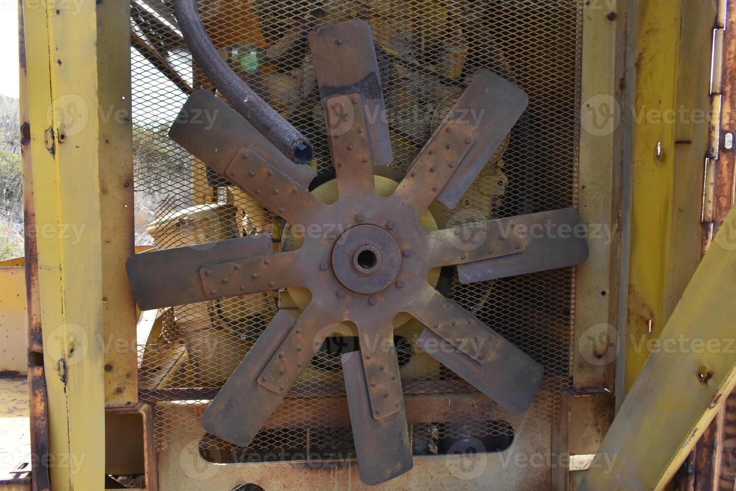 Rusty Fan on an Old Generator at an Abandoned Mine Site in Arizona photo
