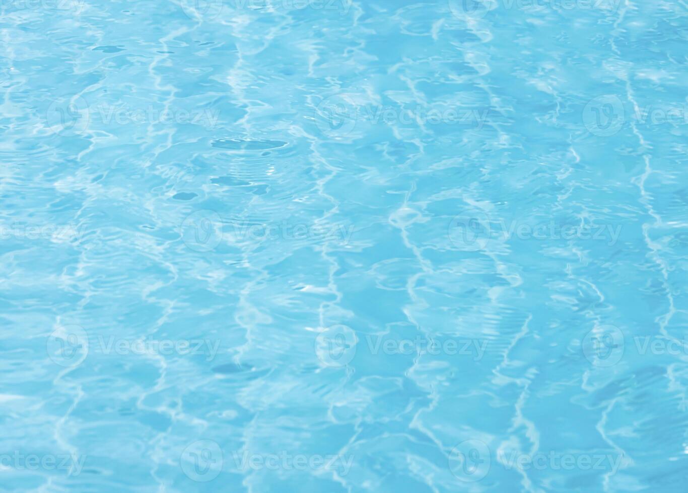 Water background for Summer banner,Empty Blurry ripples surface of sea blue for spa, cosmetic product present and text,Top view water texture circle an abstract pattern with nature light reflection photo