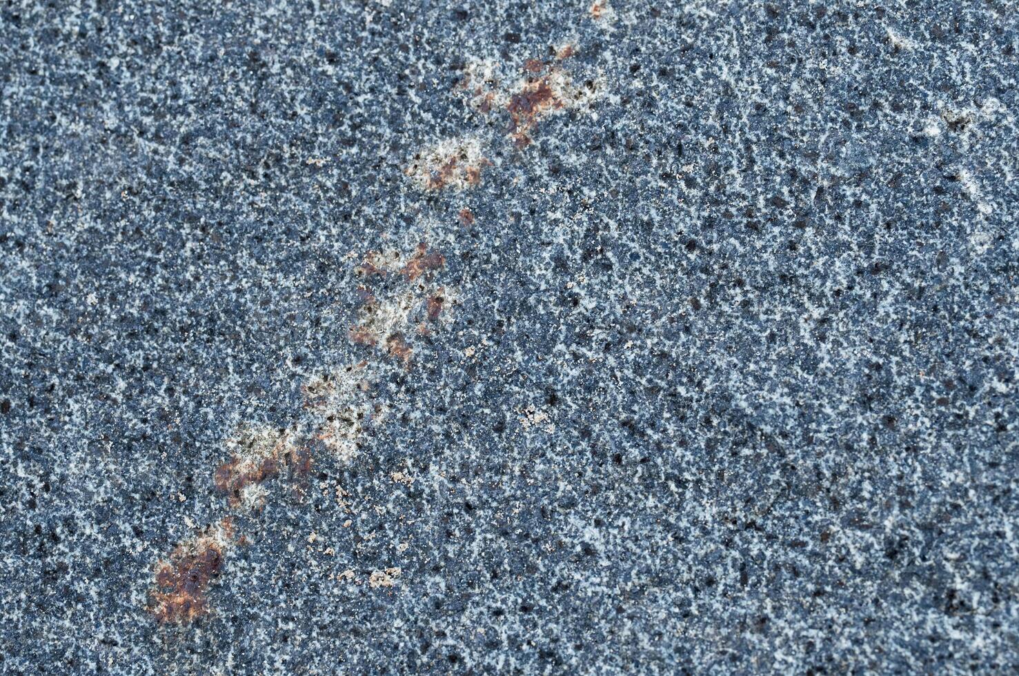 Blue background of Stone texture,Close up natural rought rock sea stone surface with cracks,Abstract background wall sand stone with grainy surface for design or texts photo
