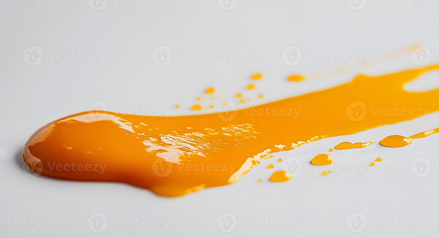 Abstract Orange Paint Swirl on White Background photo