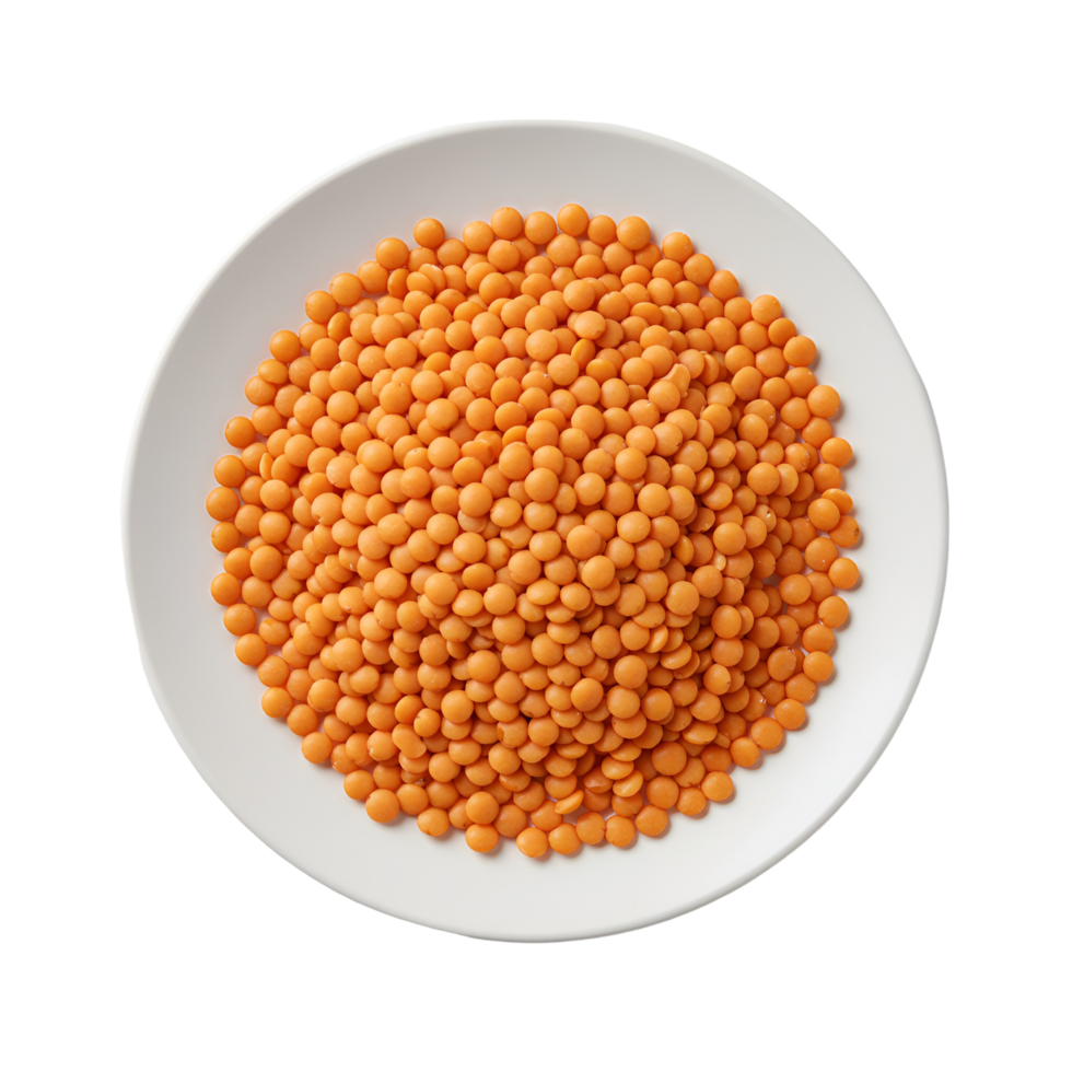 Overhead view of a white plate filled with a heap of vibrant orange lentils on a plain surface transparent background png