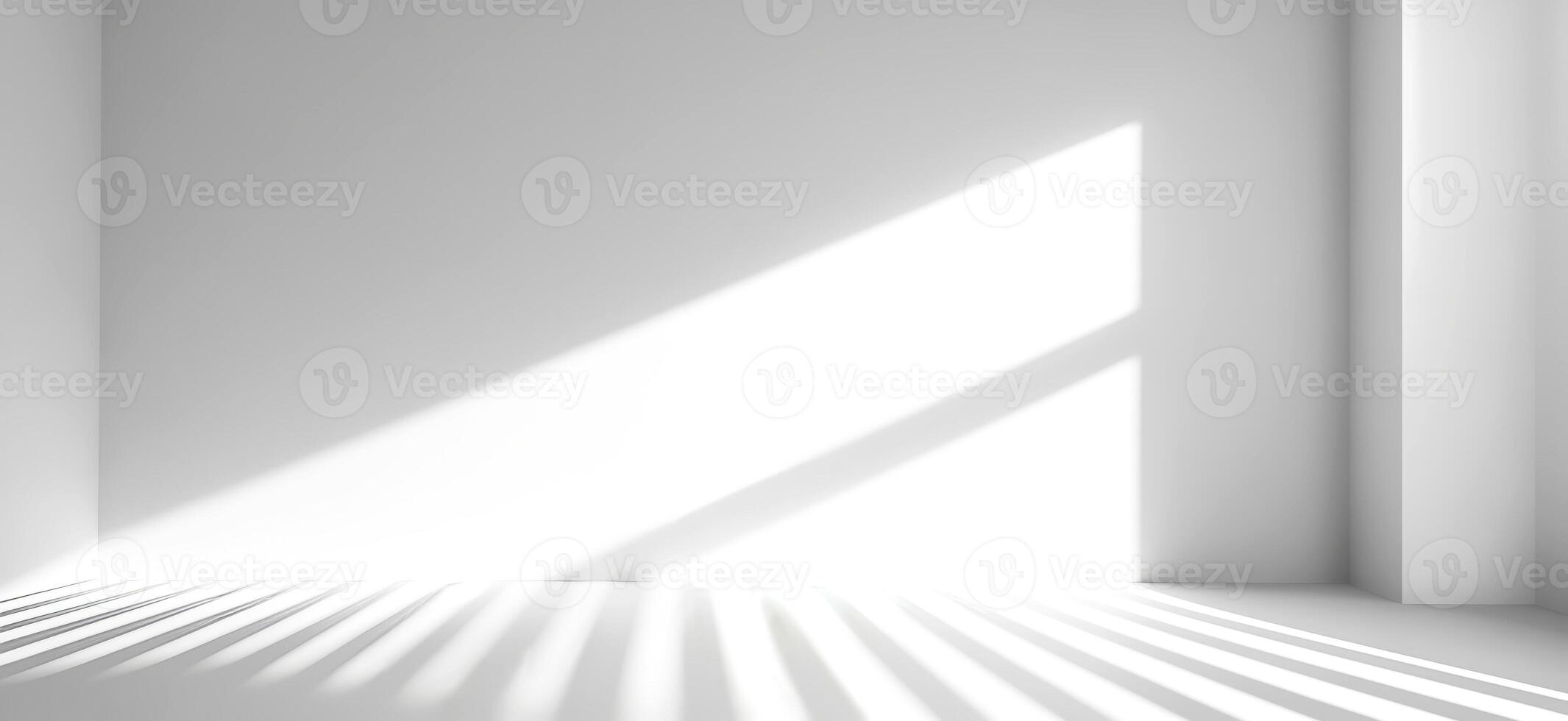 Bright, white room with natural sunlight. Linear shadows dance across floor and empty wall with copy space, creating play of contrasts and geometry, serenity and calmness, purity and photo