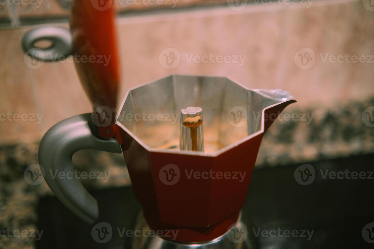 Brewing red moka coffee at home. photo