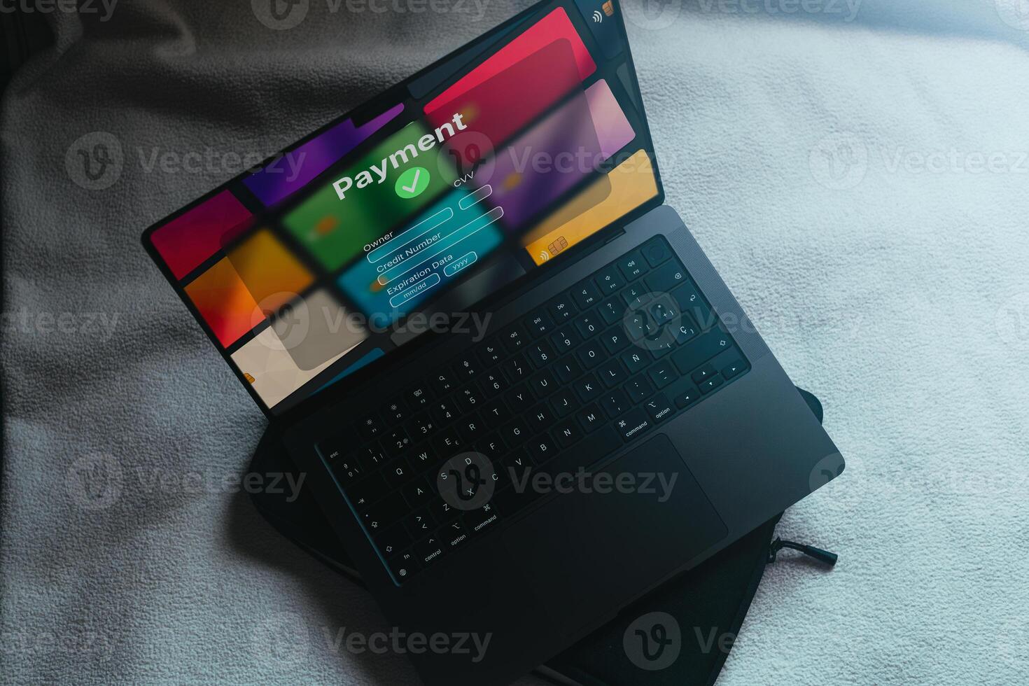 Top view of open laptop with banking interface on screen for payment. Shopping online concept. Financial transfer. photo