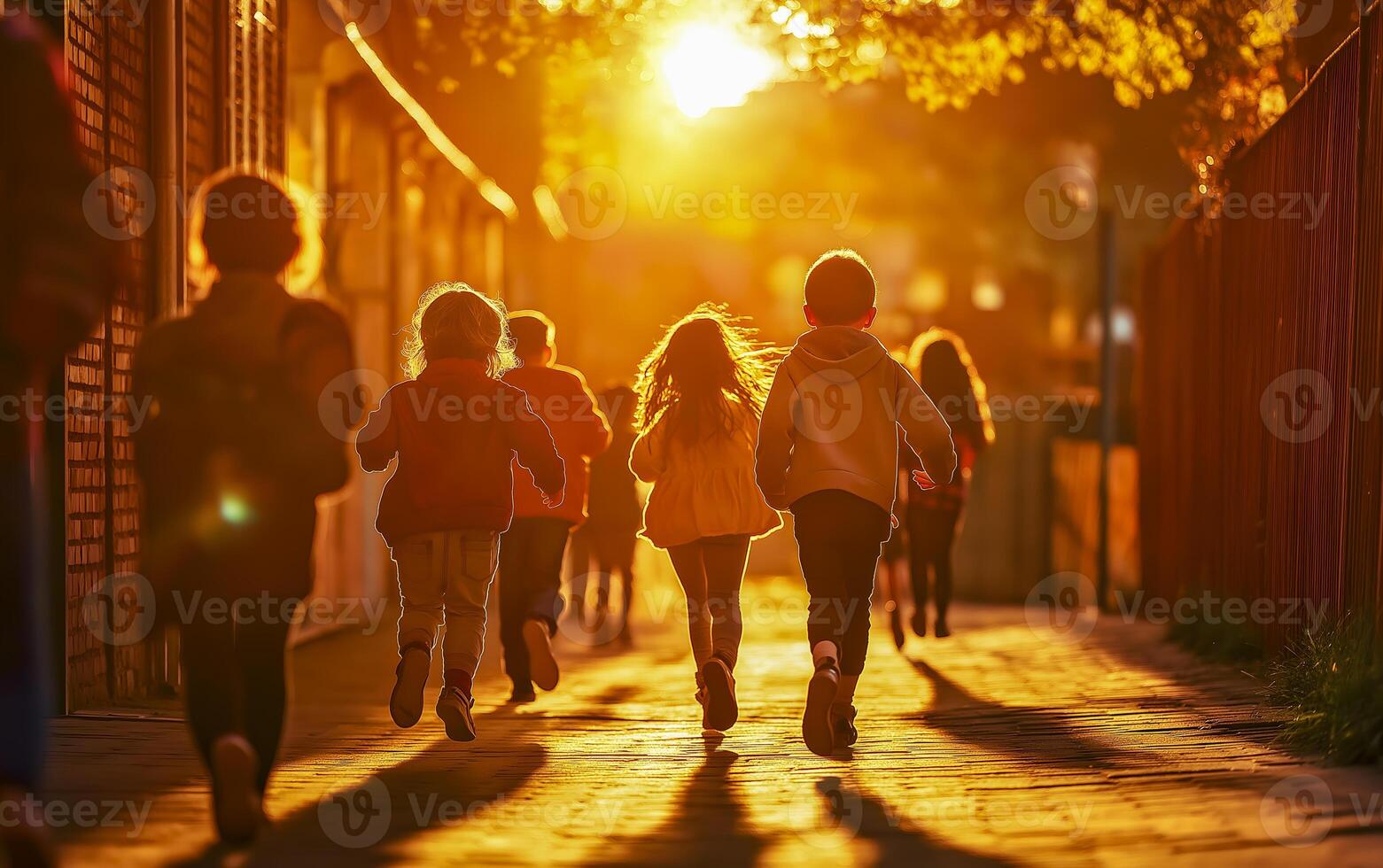 Cheerful multiethnic kids playing running on blurred background in park. Horizontal view. photo