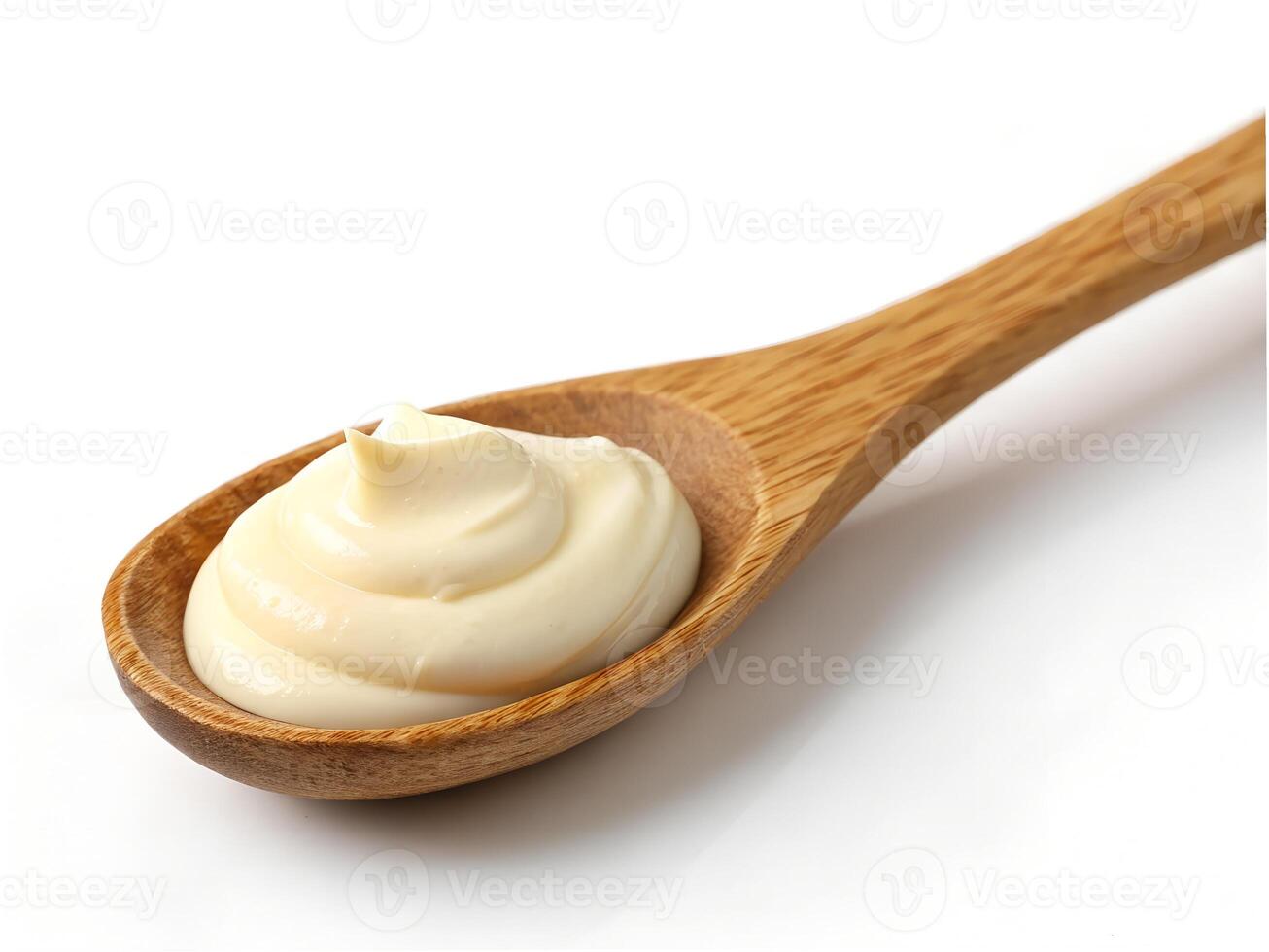 Small Wooden Spoon with Mayonnaise Isolated on White Background. photo