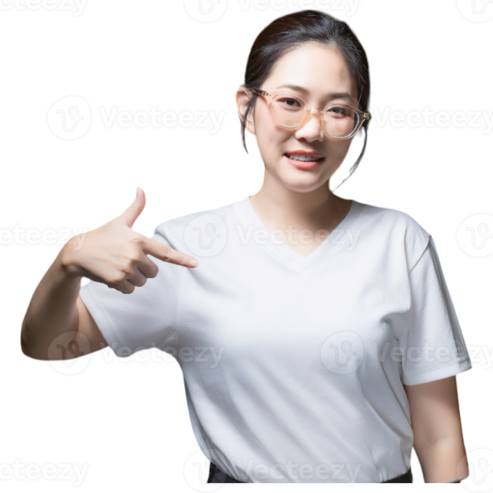 A woman in a white t-shirt is smiling and pointing to her shirt, conveying a friendly and inviting demeanor. png