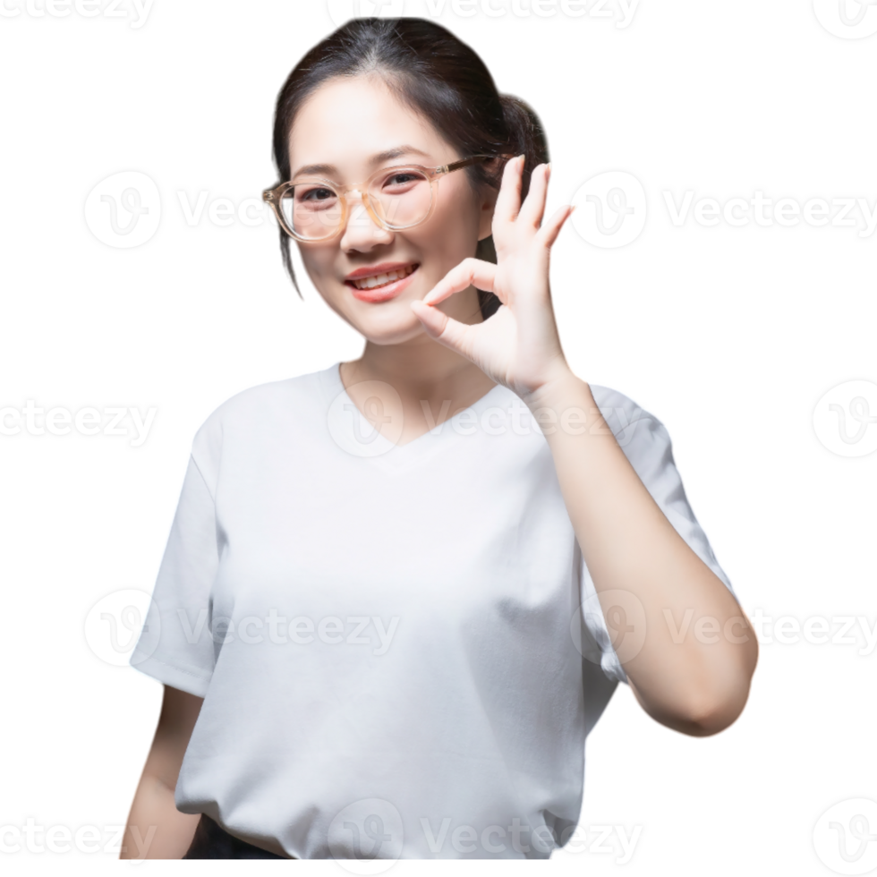 A young woman in a white shirt and glasses smiles while making an OK hand gesture. png