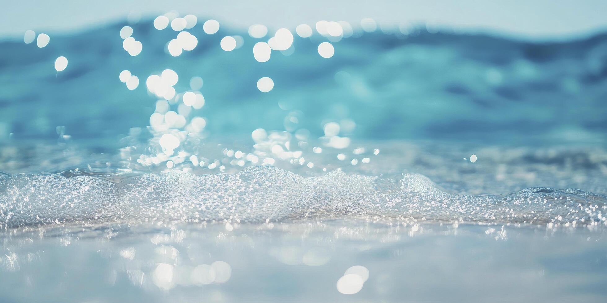 A wave is seen in the ocean with bubbles photo