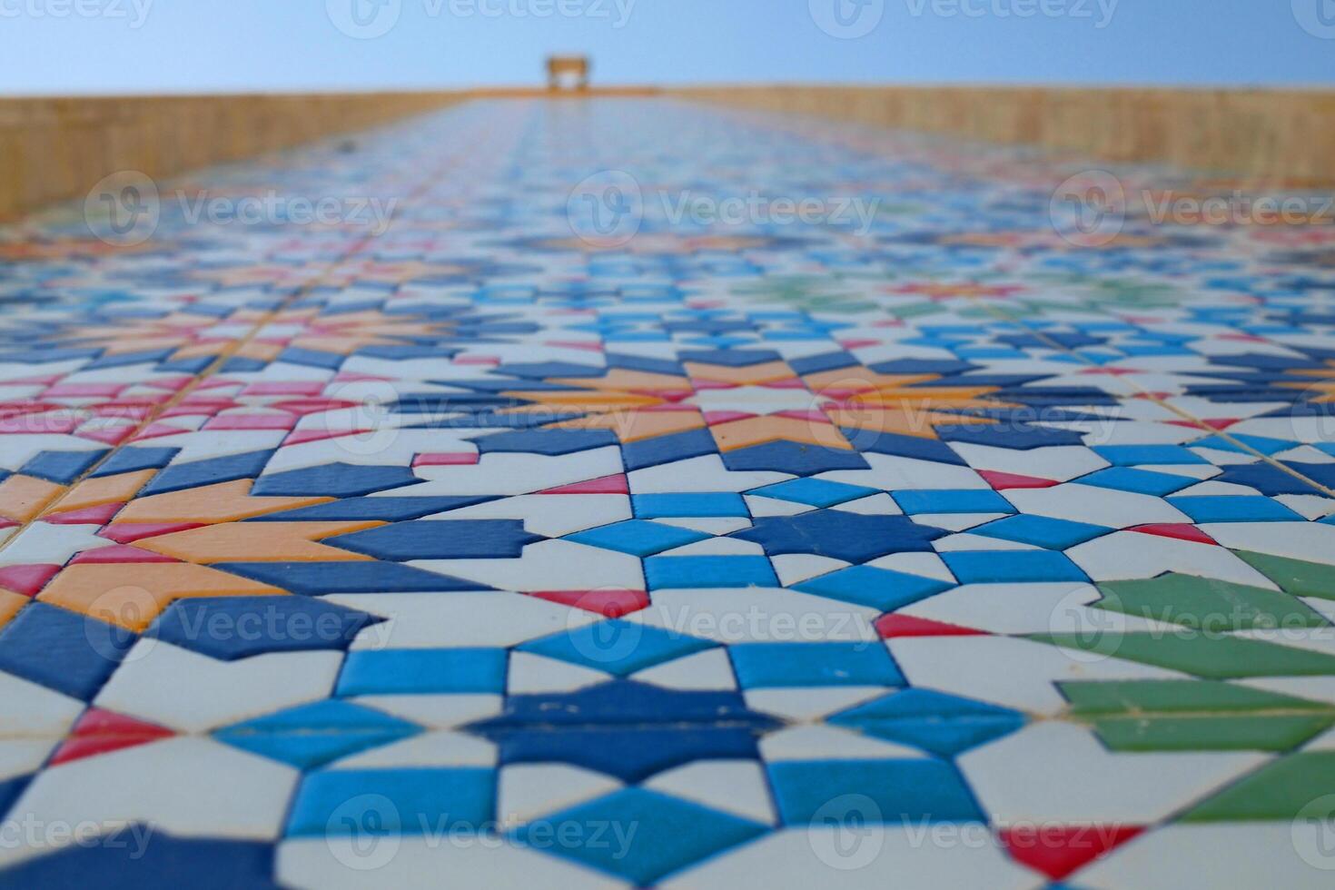 Detailed view of a vibrant mosaic wall in an architectural setting photo