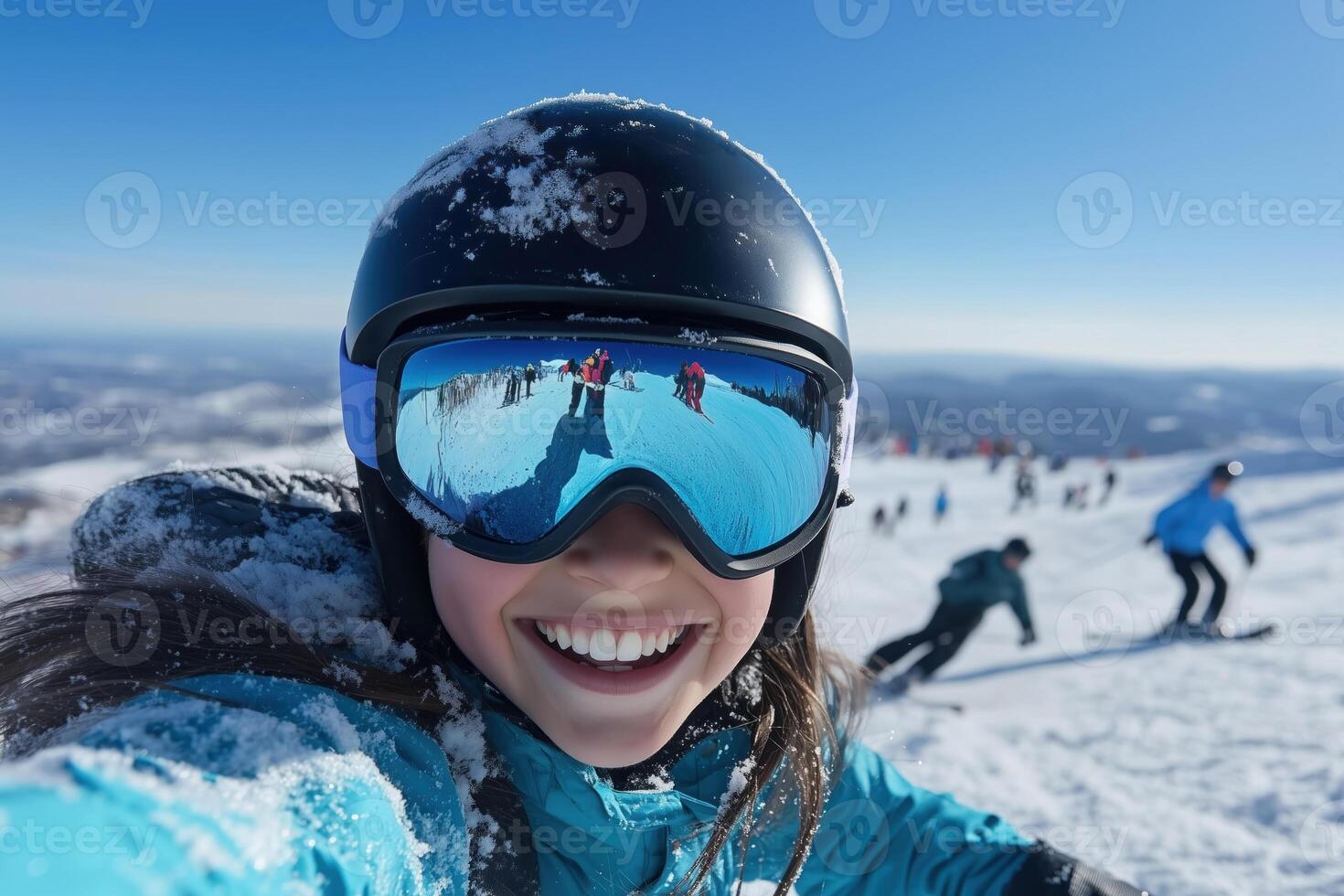 Portrait of a girl in a ski helmet and goggles on the background of the mountains photo