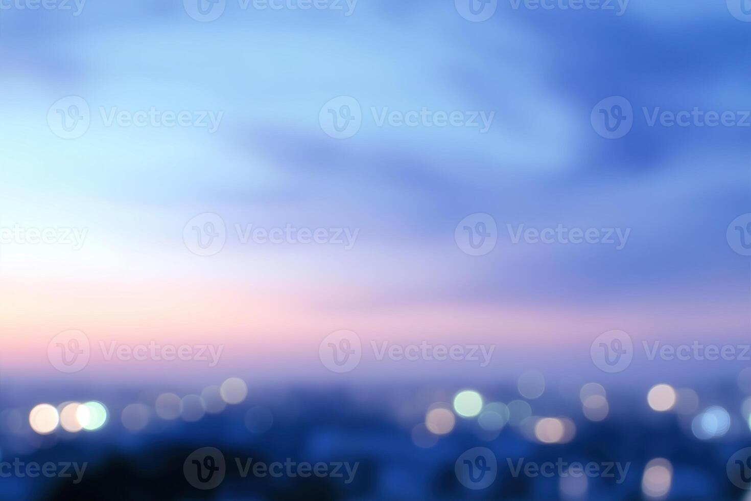 Blurred view of cityscape at twilight time, abstract background. photo