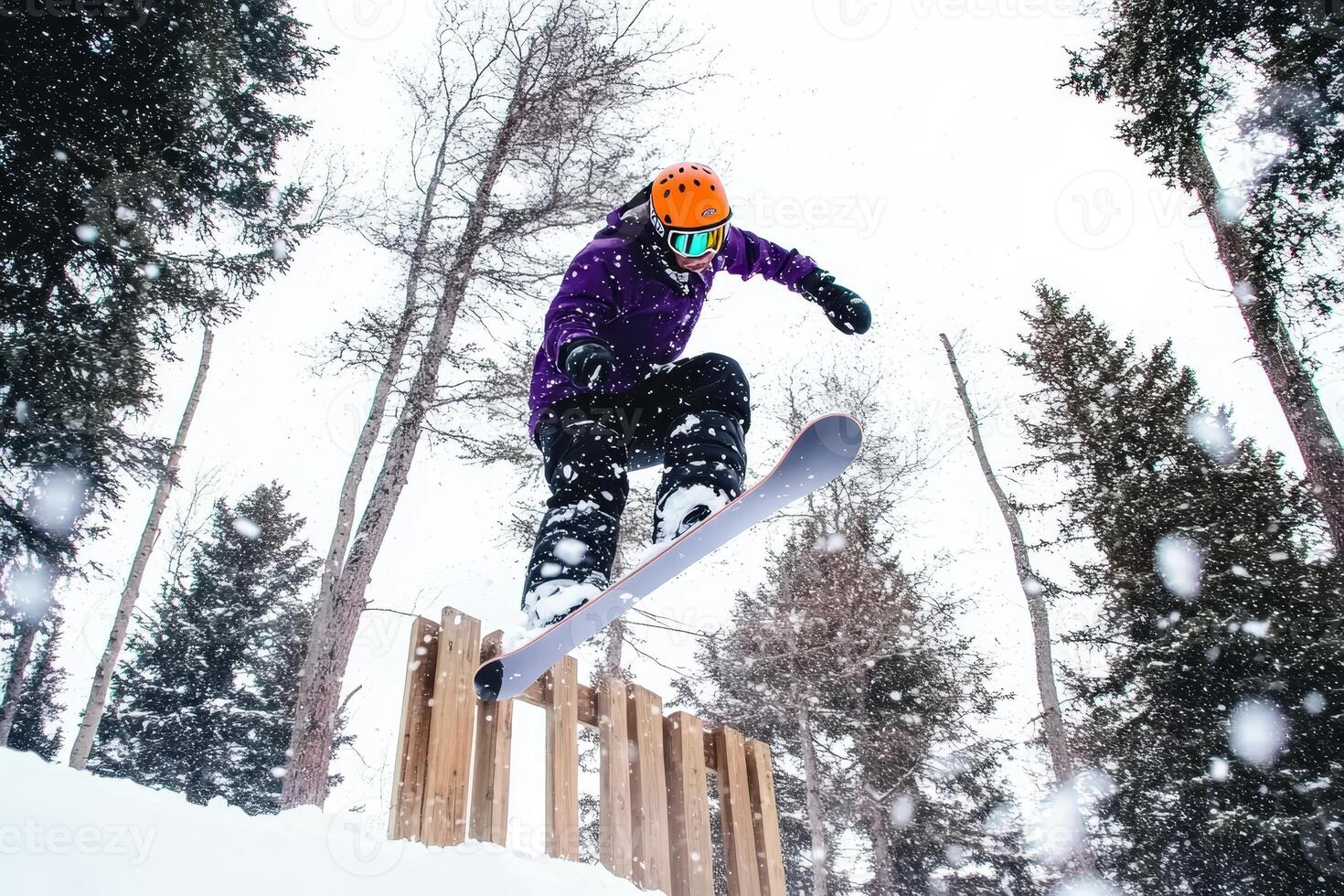 Snowboarder executes thrilling backflip photo
