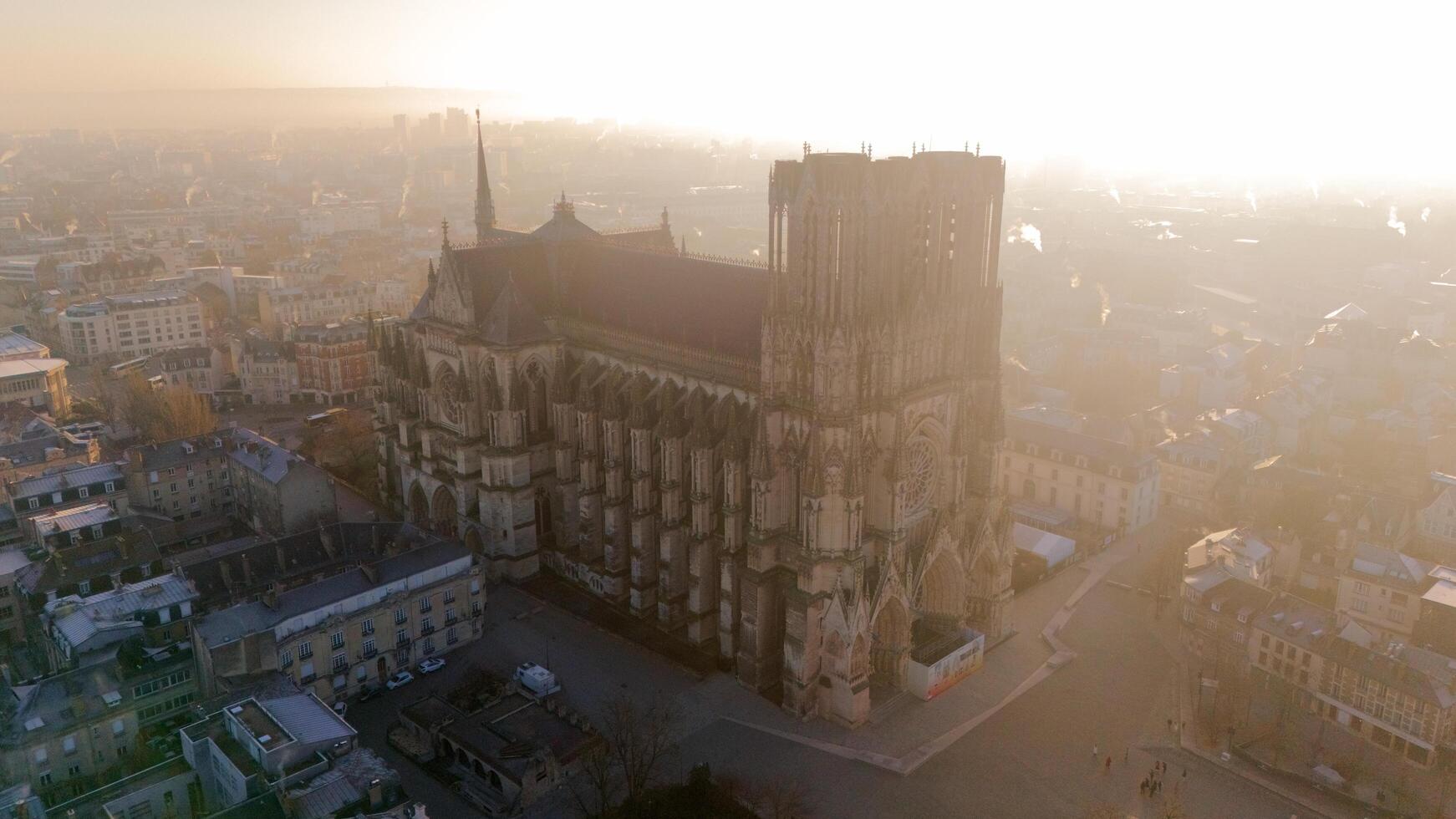 Morning Aerial View of Cathedral Bathed in Golden Light Reims, France 01.02.2025 photo