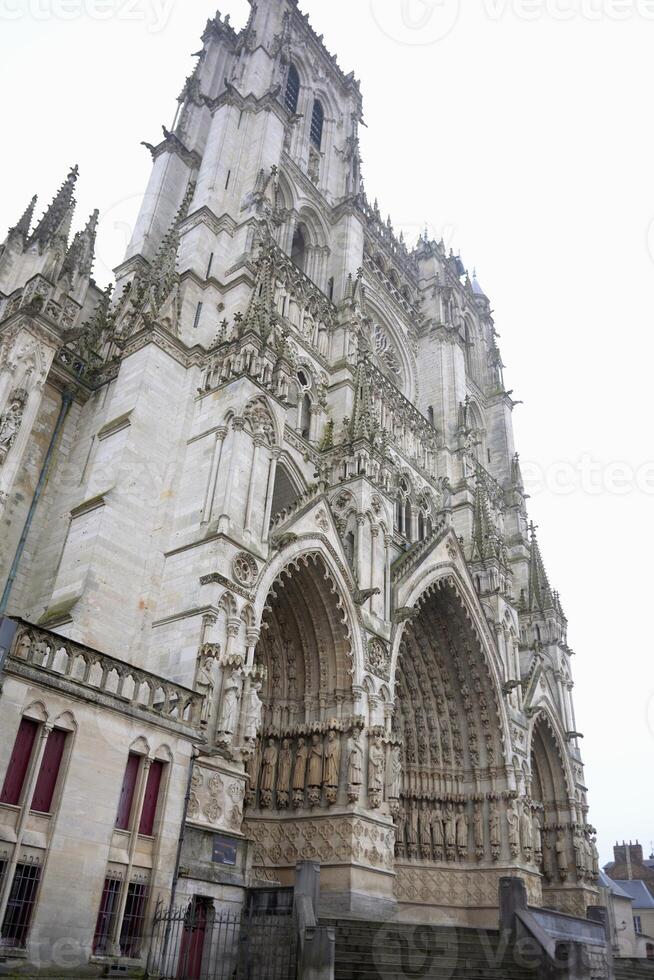 Magnificent facade of Amiens Cathedral in France photo