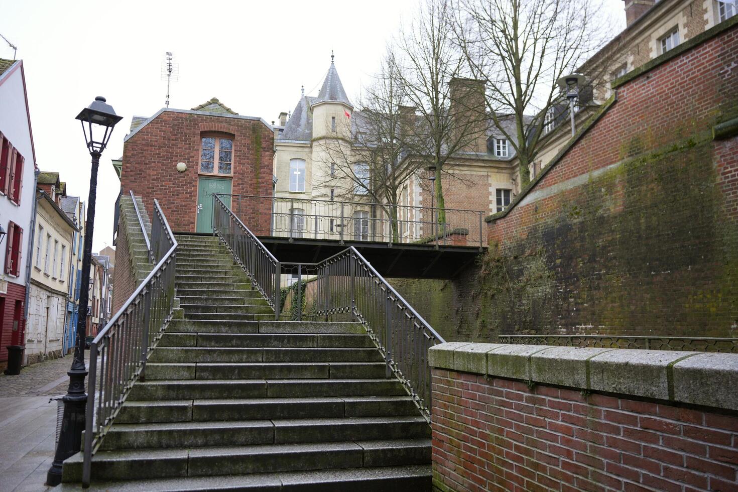 Amiens. France 17.02.2025 Old European Staircase Leading to Historic Buildings photo