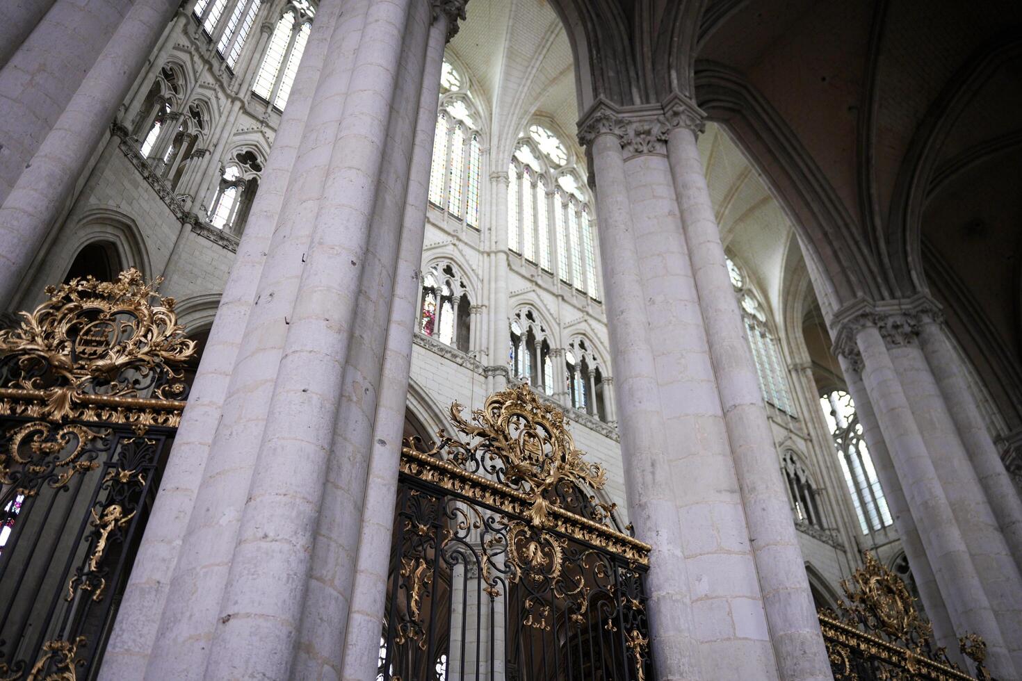 Ornate golden gate and Gothic architecture in Amiens. France 17.02.2025 photo