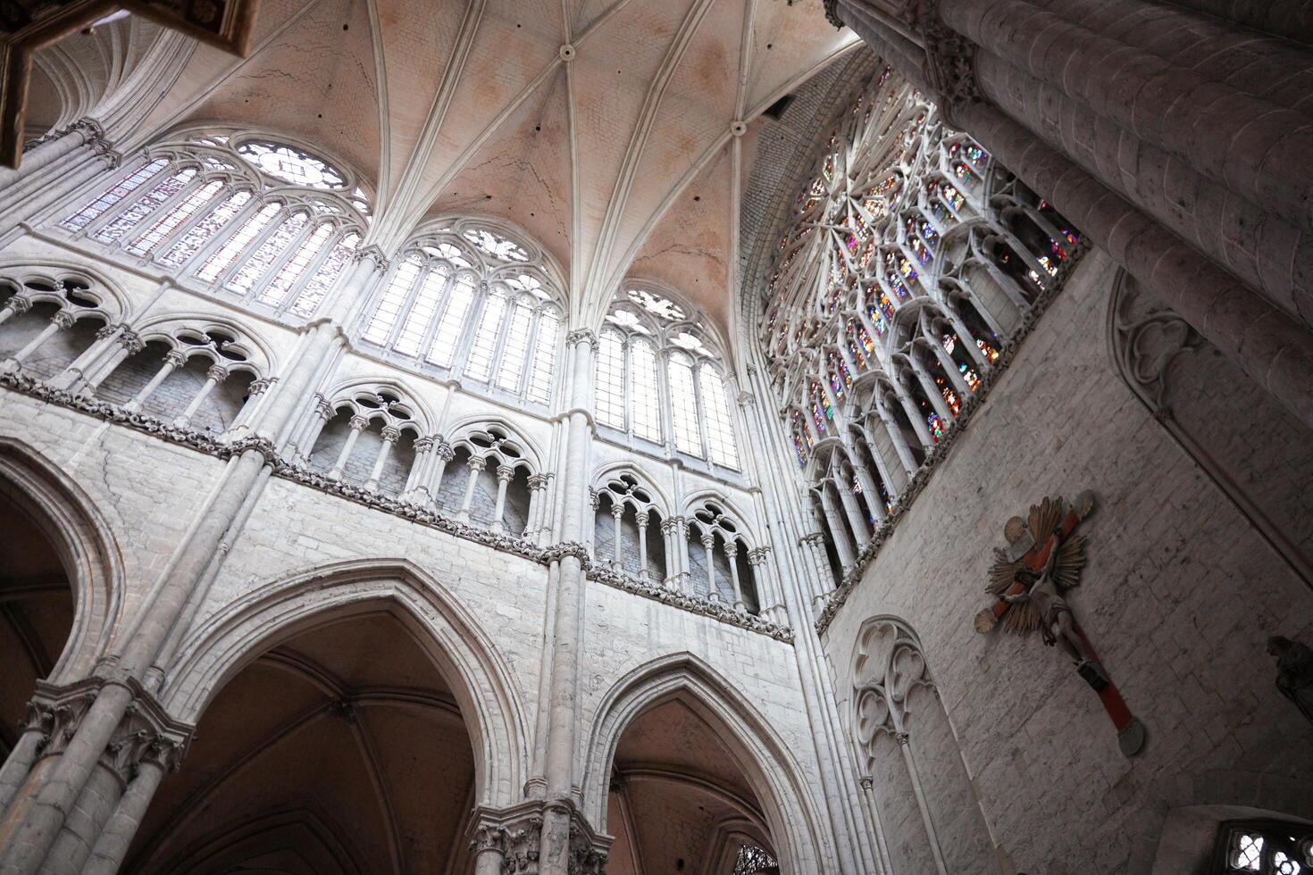 Cathedral ceiling with crucifix and stained glass in Amiens. France 17.02.2025 photo
