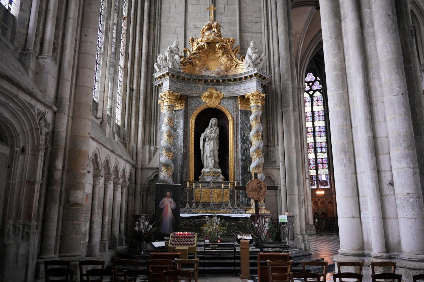 Ornate altar with Virgin Mary statue. Amiens, France 10.02.2025 photo