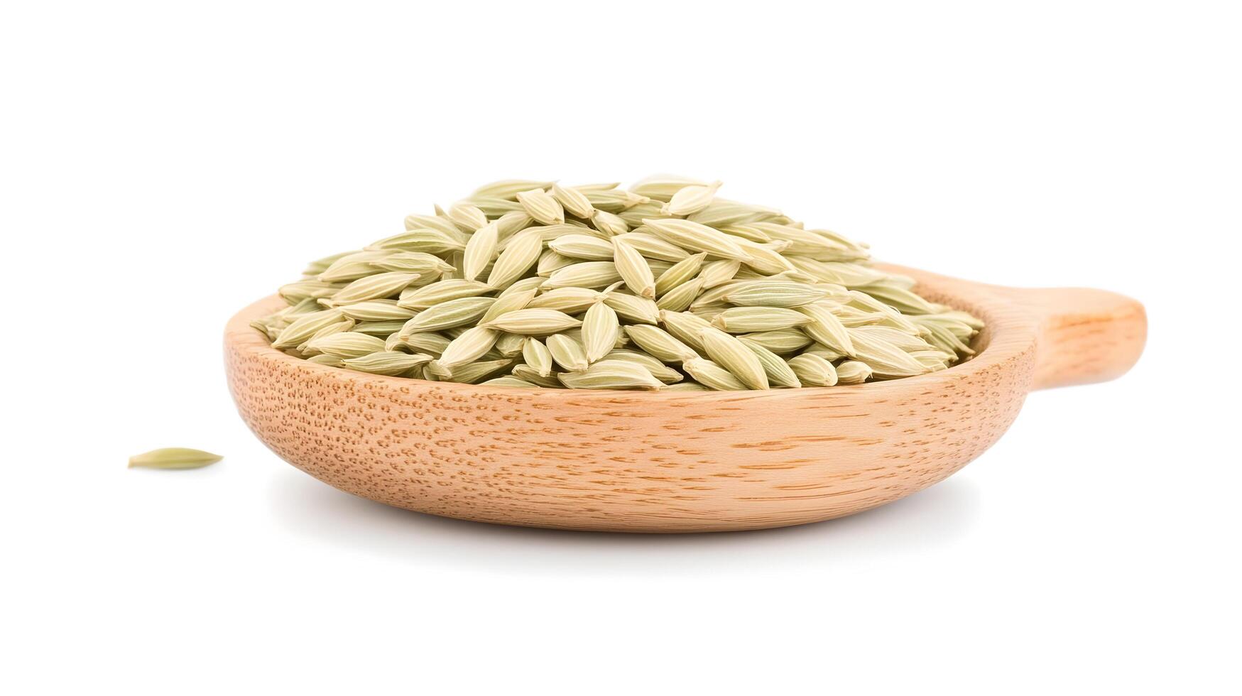 A bowl of fragrant fennel seeds, a culinary treasure, ready to enhance dishes with their subtle anise flavor, presented in warm, natural light against a clean white backdrop. photo