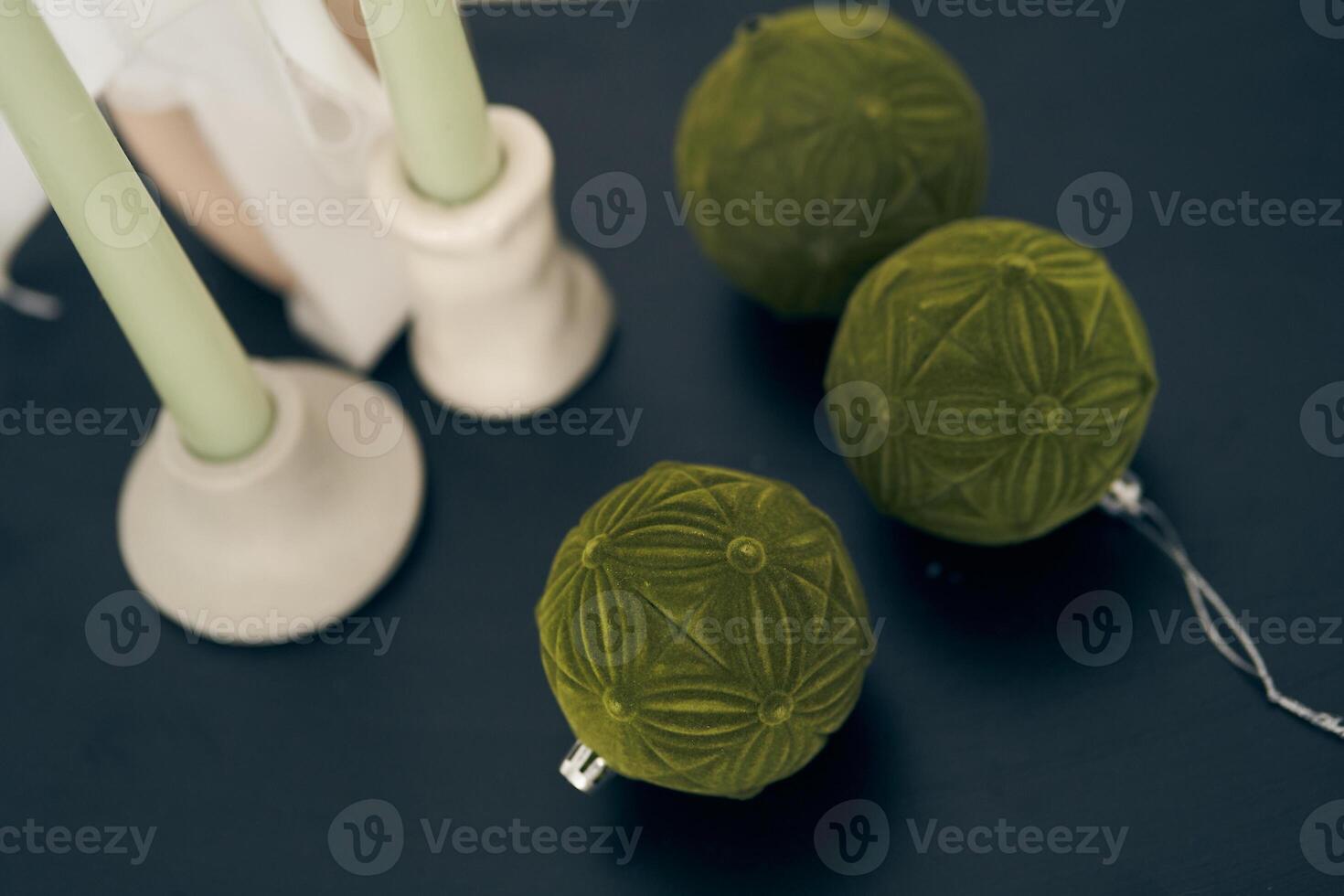 Christmas composition. Background of green toy balls. The concept of Christmas, decorations, new year. Flat layout, top view, a place to copy. photo