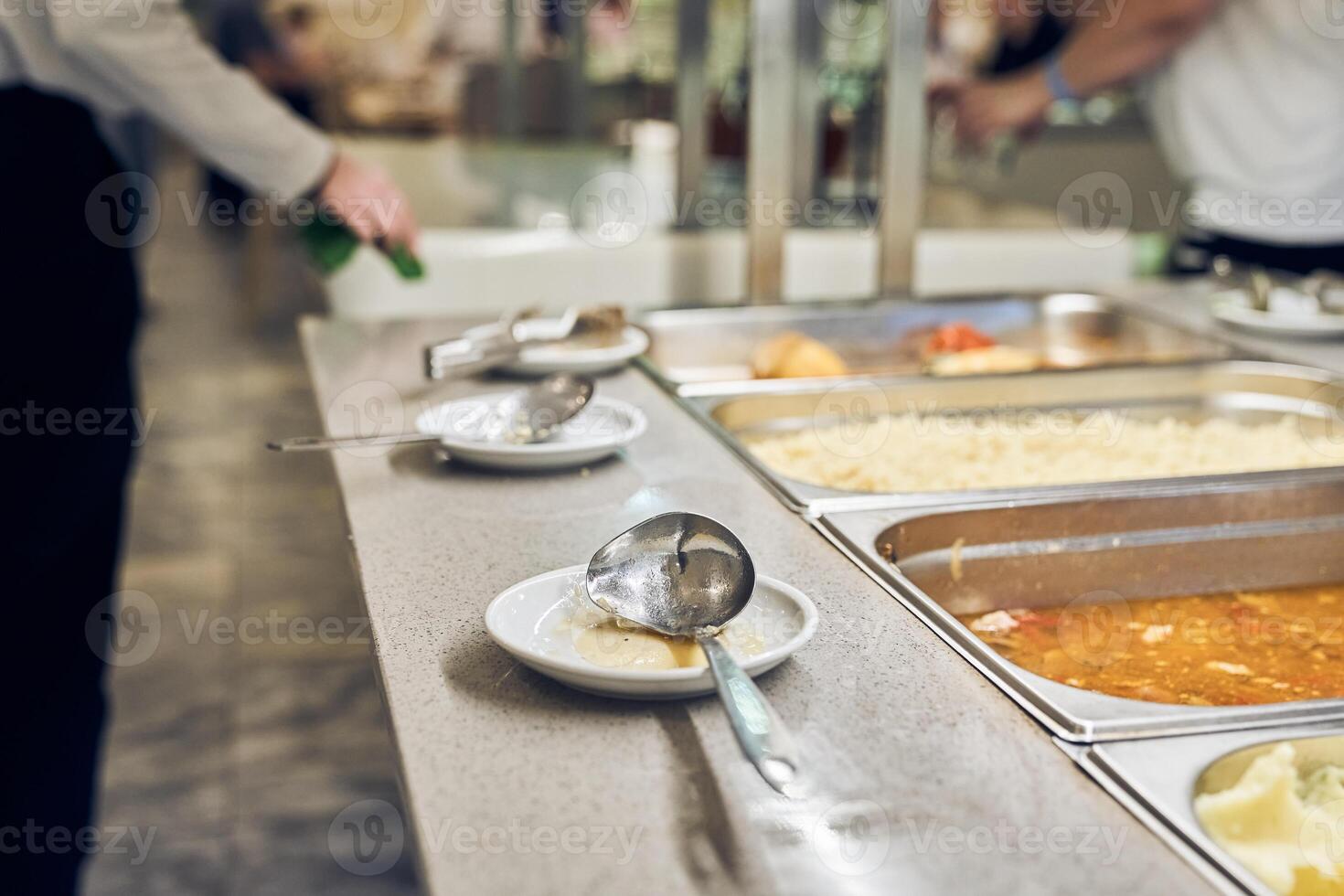 Buffet service at the hotel. There is a hot side dish in the containers. Offering self-service options, ideal for creating a copyspace image. photo