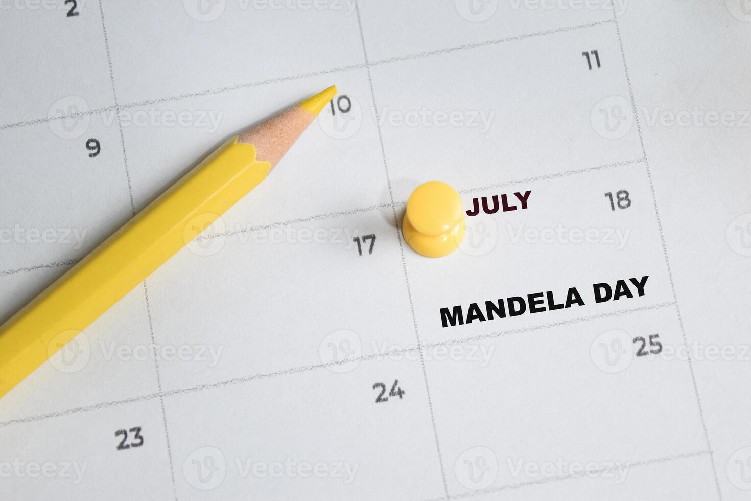 July 18. writing text mandela day on calendar date. Save the date. Important date. Holiday day of the year concept photo