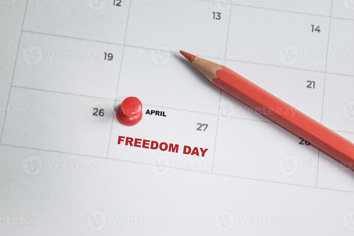 April 27. writing text Freedom day on calendar date. Save the date. Important date. Holiday day of the year concept photo