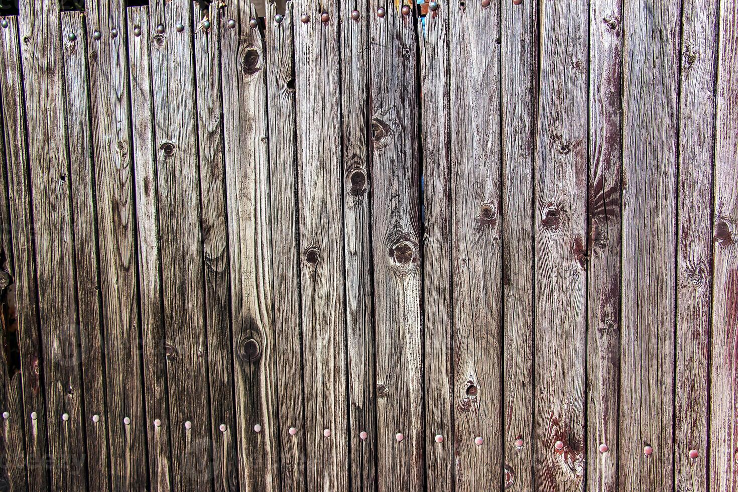 Background of dark natural old boards. Close-up. Abstract texture. photo