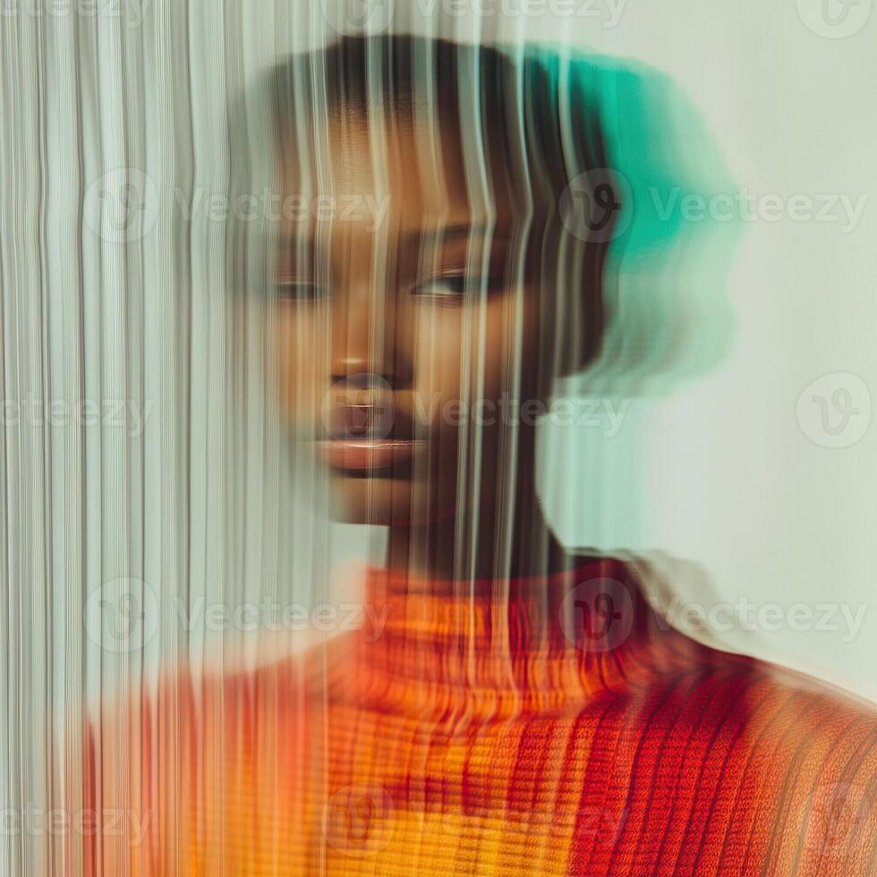 a woman with a colorful dress and a blurred background photo