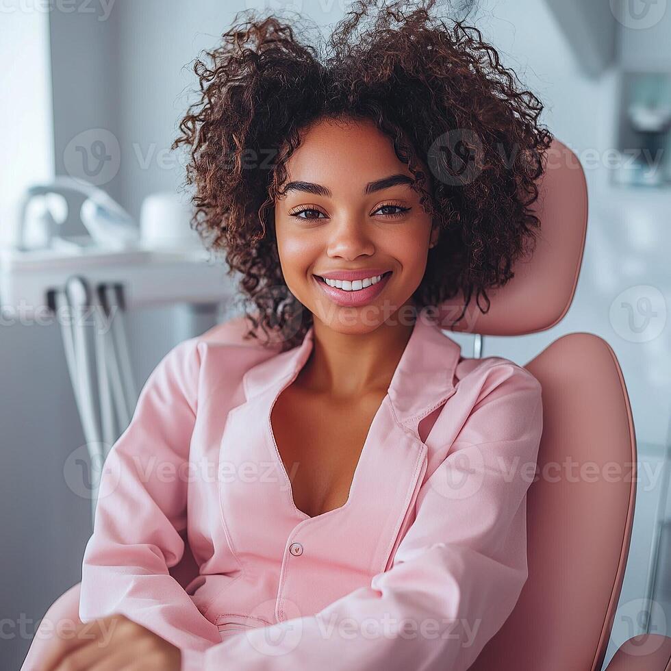 Smiling Woman in Dental Chair at Clinic photo