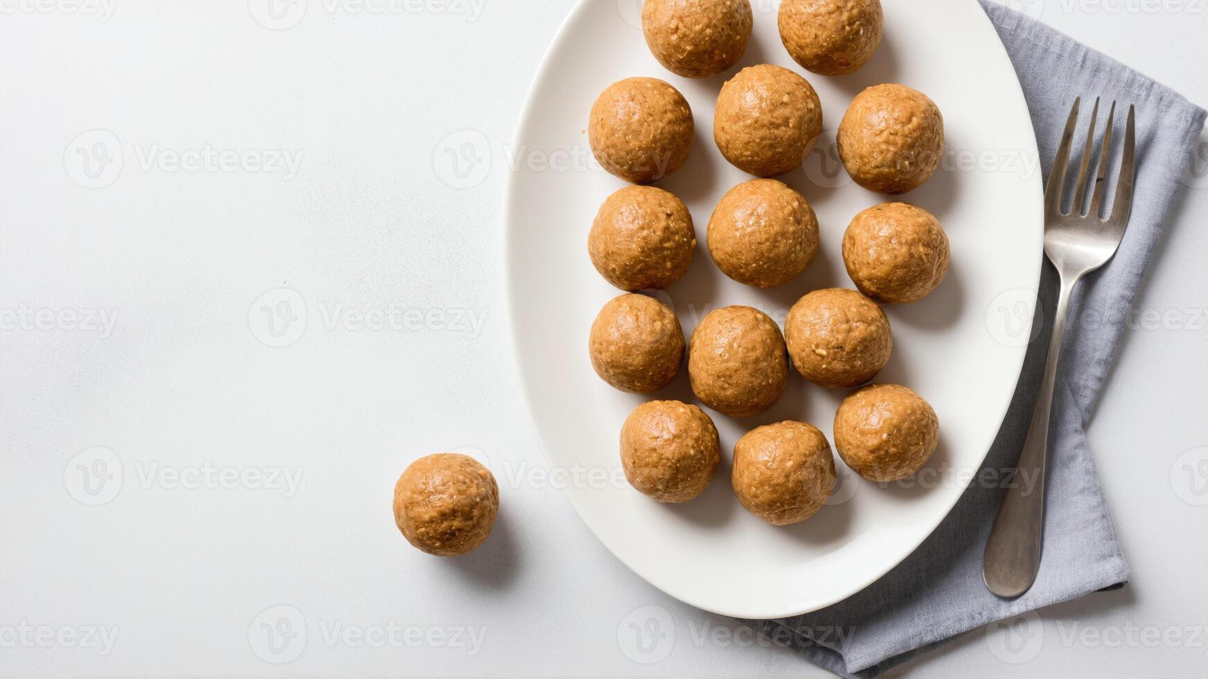 A plate of cookies on a white table photo