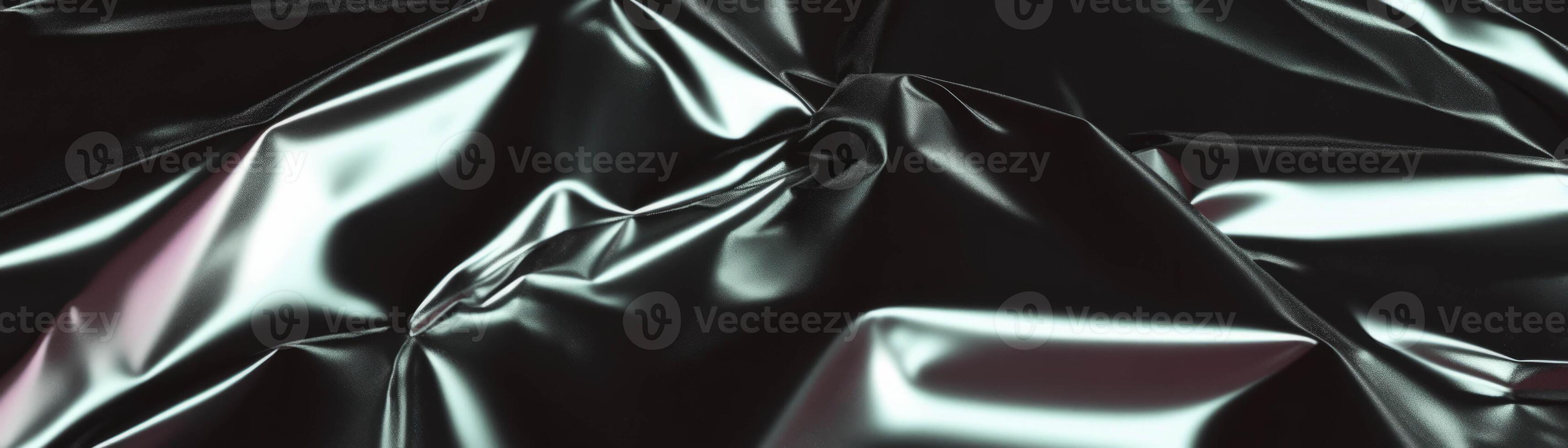 Close-up view of crumpled aluminum foil displaying halftone texture reflecting light photo