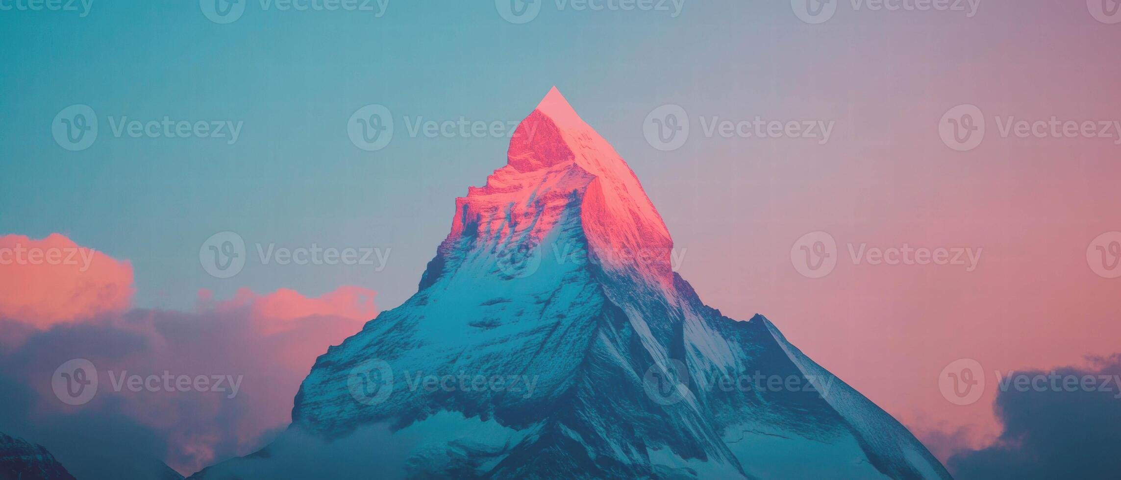 Symmetrical mountain peak rises under a vibrant sky at sunset photo