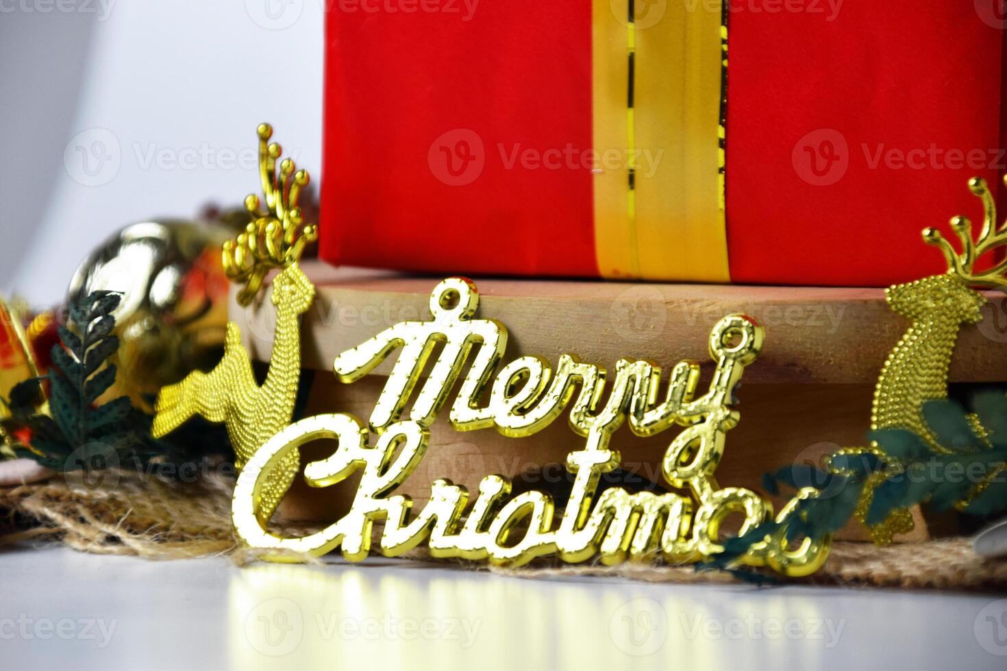 Elegant Gold Merry Christmas Lettering and Holiday Decorations photo