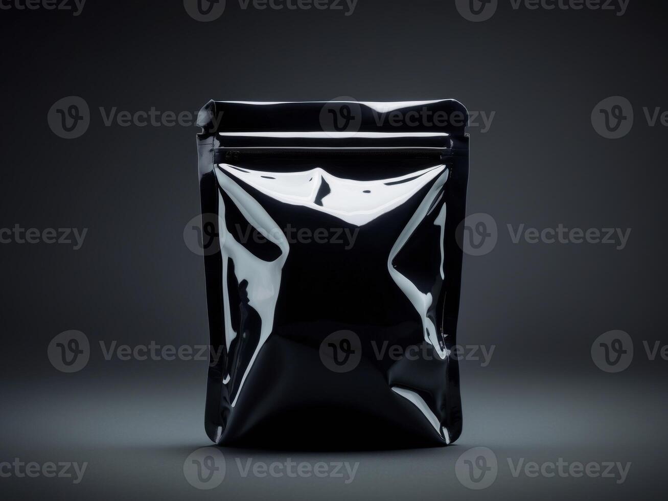 Mysterious Unmarked Black Pouch with Glossy Texture on Dark Background. photo