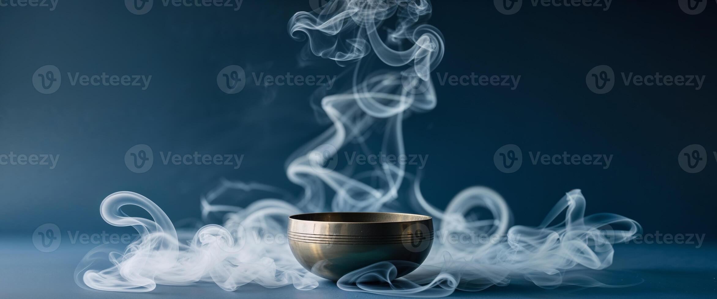 A cup of smoke is sitting on a table photo
