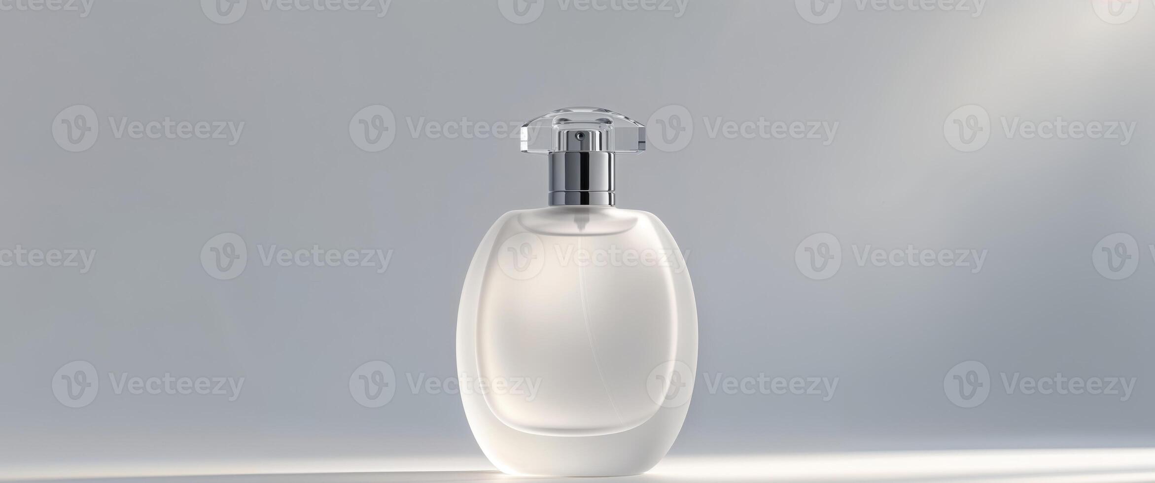Frosted glass perfume bottle with metallic cap in atmospheric lighting. photo