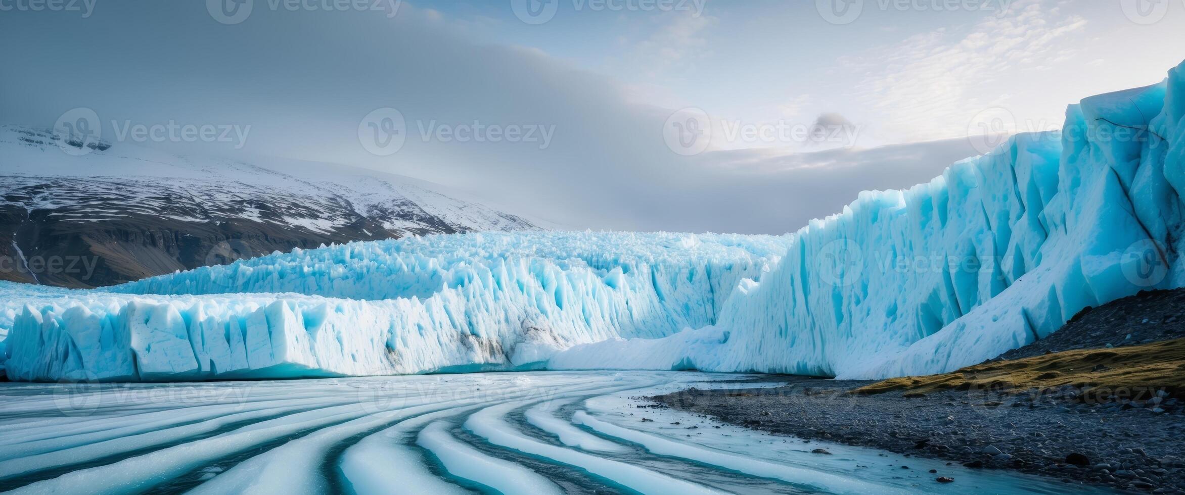 dynamic nature of glaciers representing continuous freezing and thawing processes and their impact on shaping land. photo