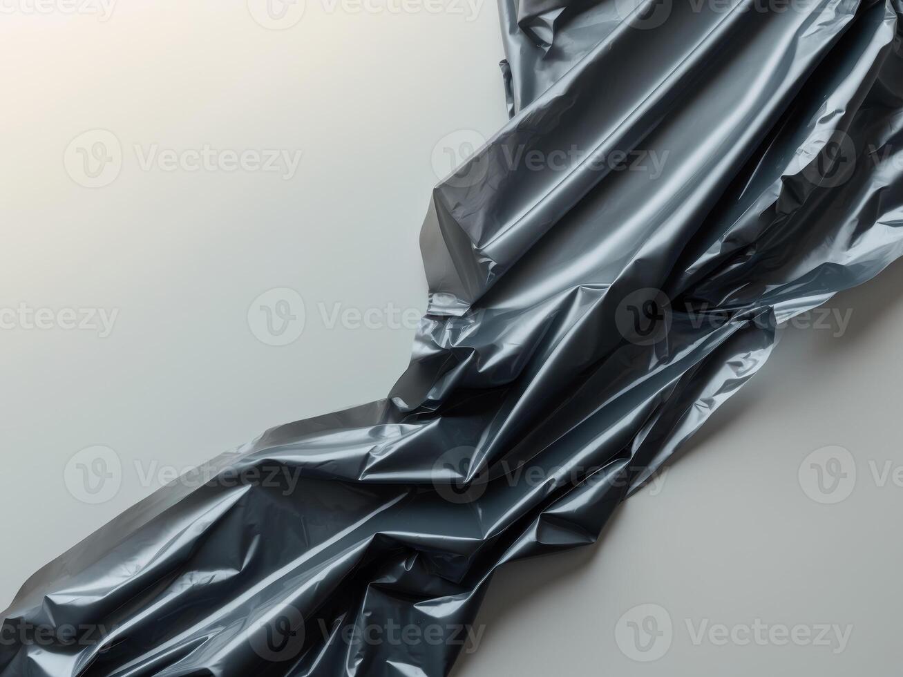 A black and white photo of a piece of plastic