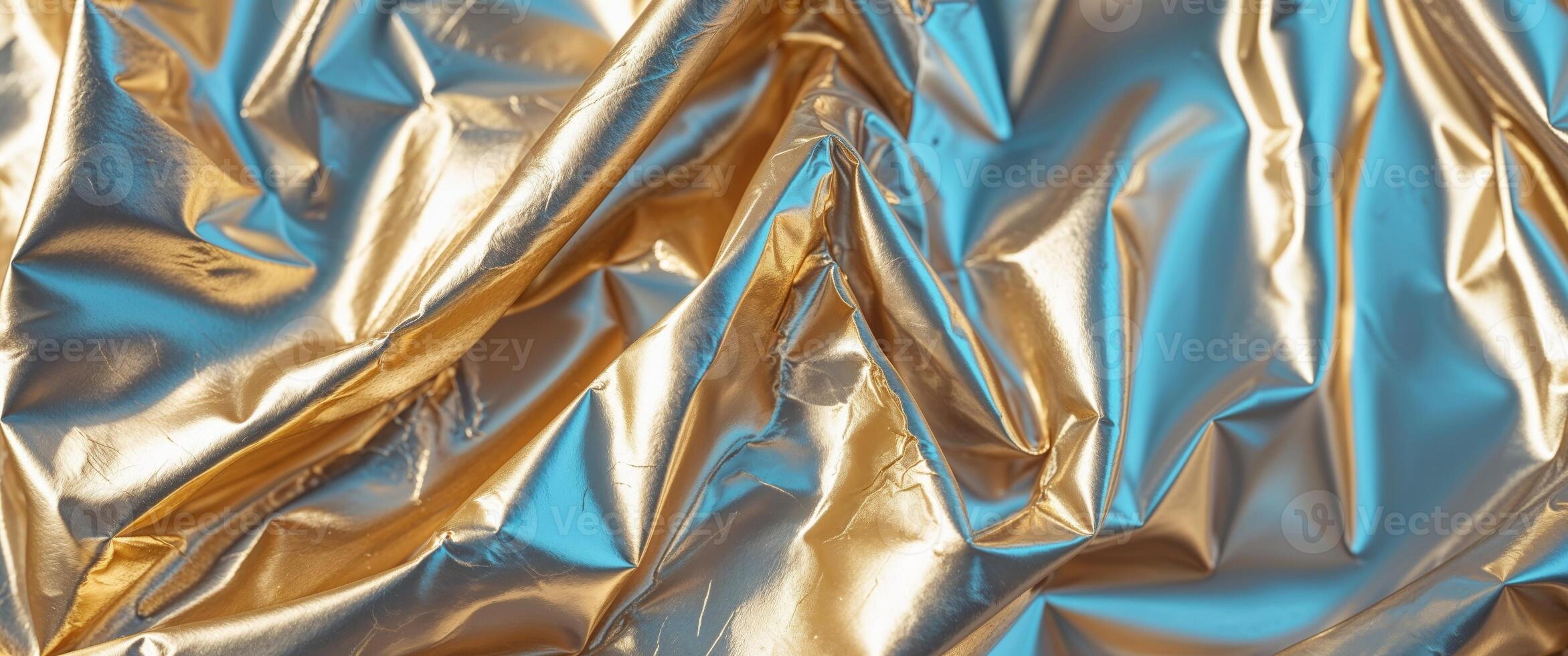 Luxurious crumpled gold metal foil texture background for design and decoration. photo