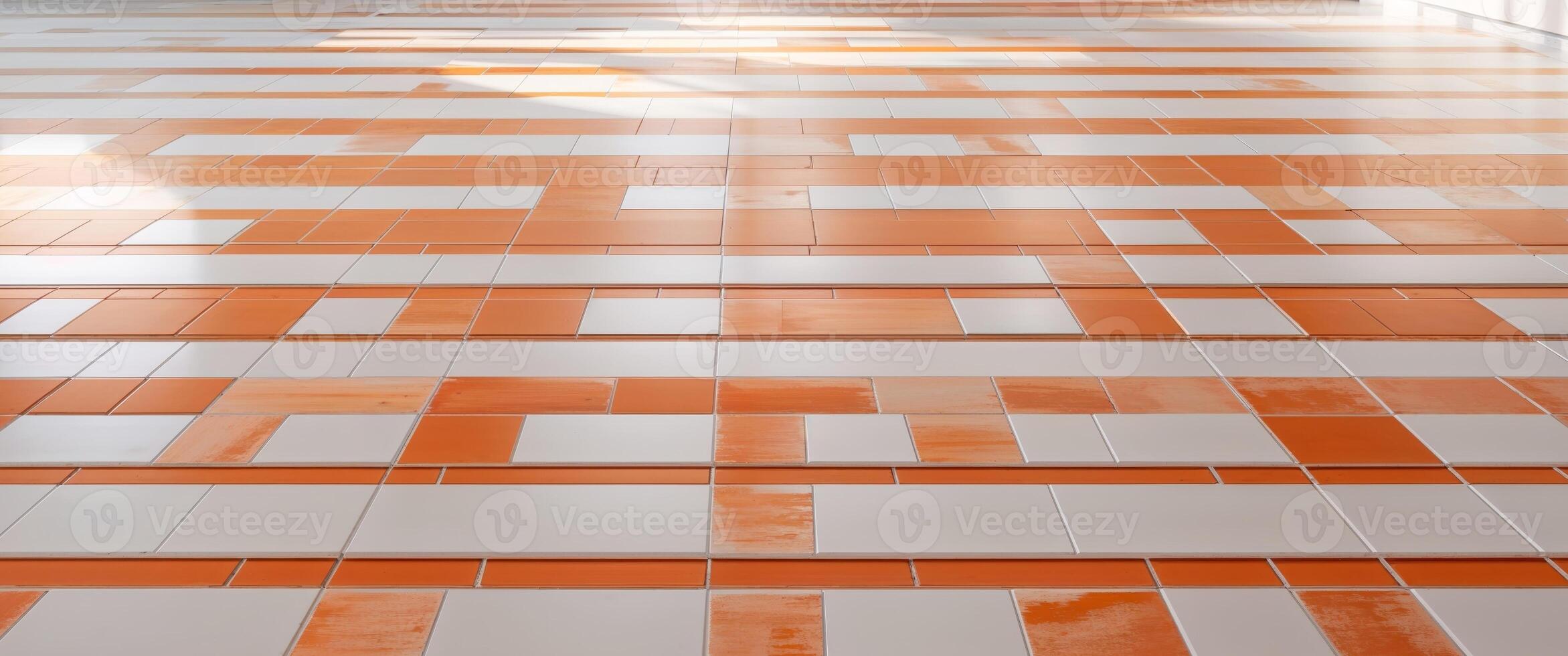 A large room with orange and white tiles photo