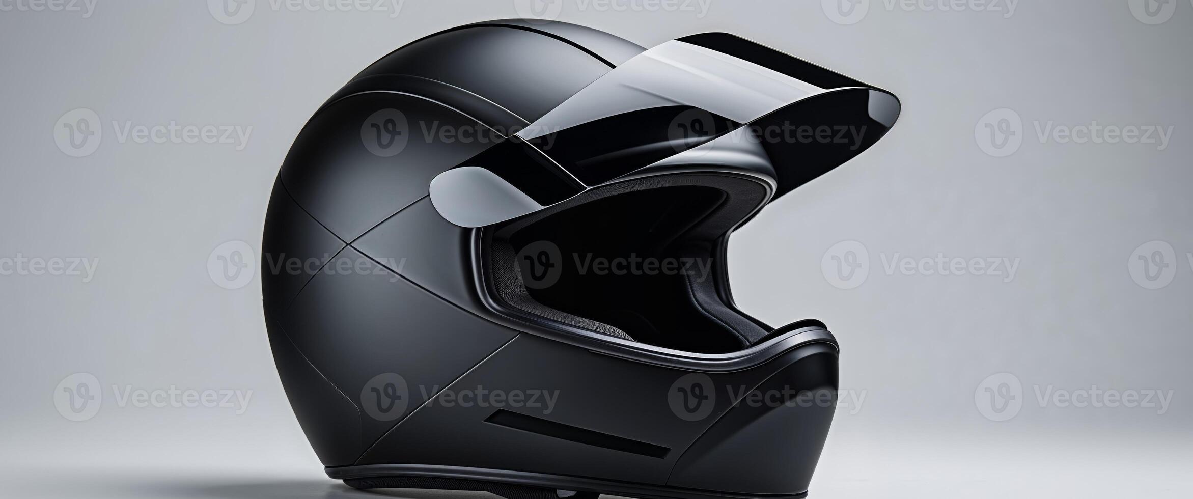 Matte Black Protective Helmet with Integrated Visor. photo