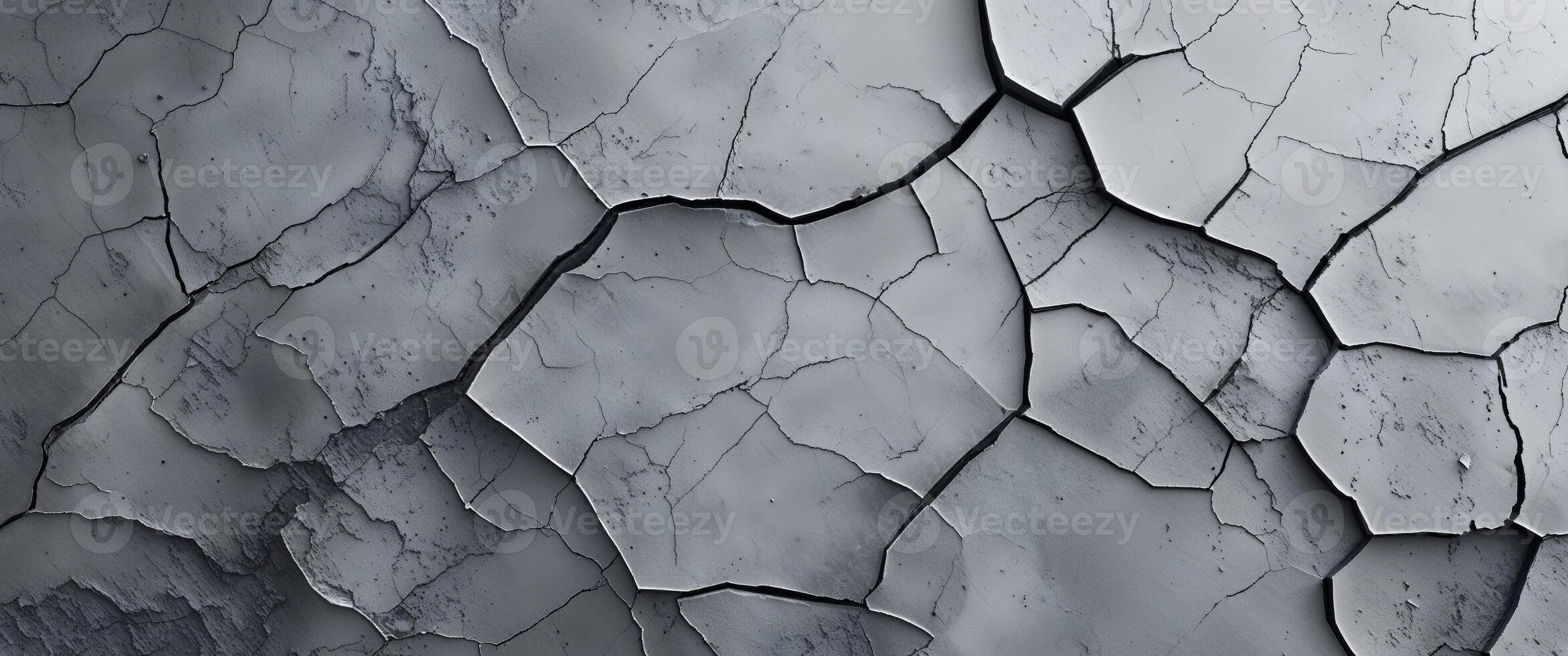 Gray textured cracked surface background photo