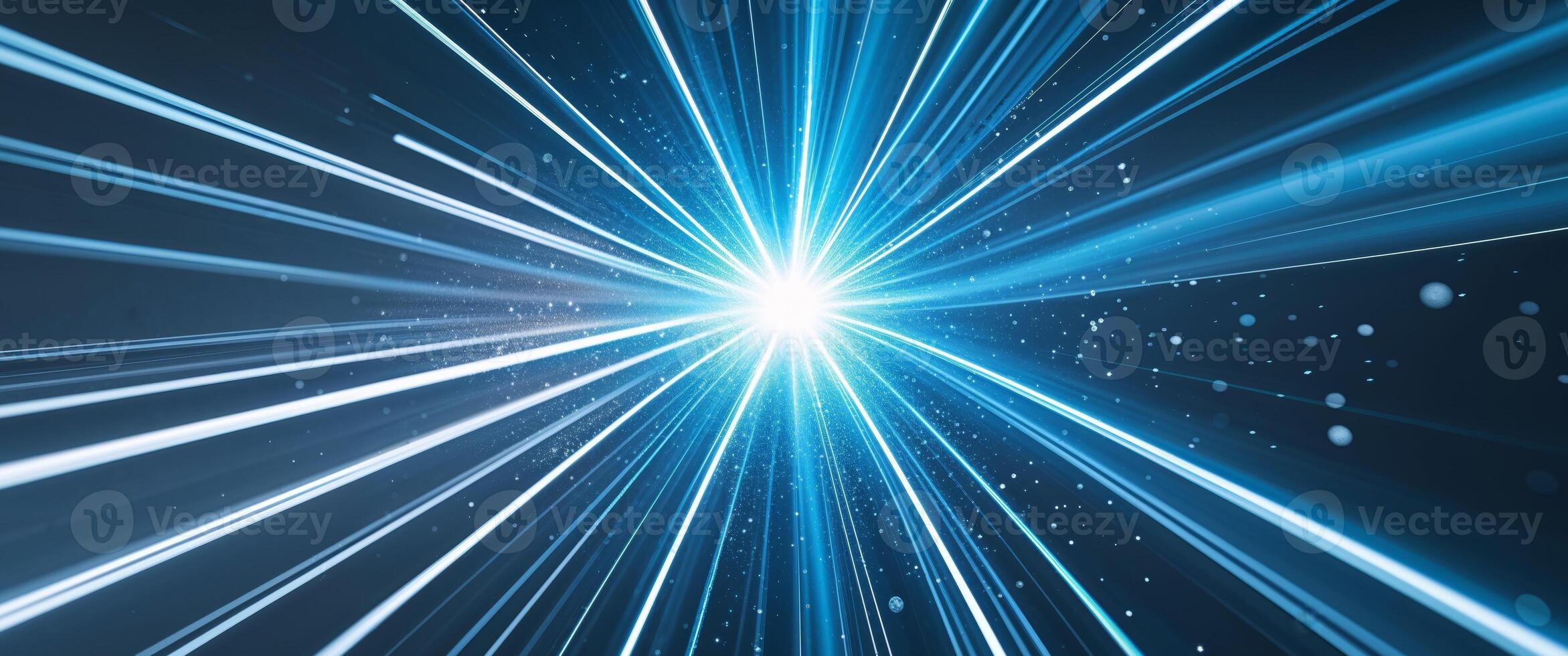 A blue light beam is shining through the dark background photo