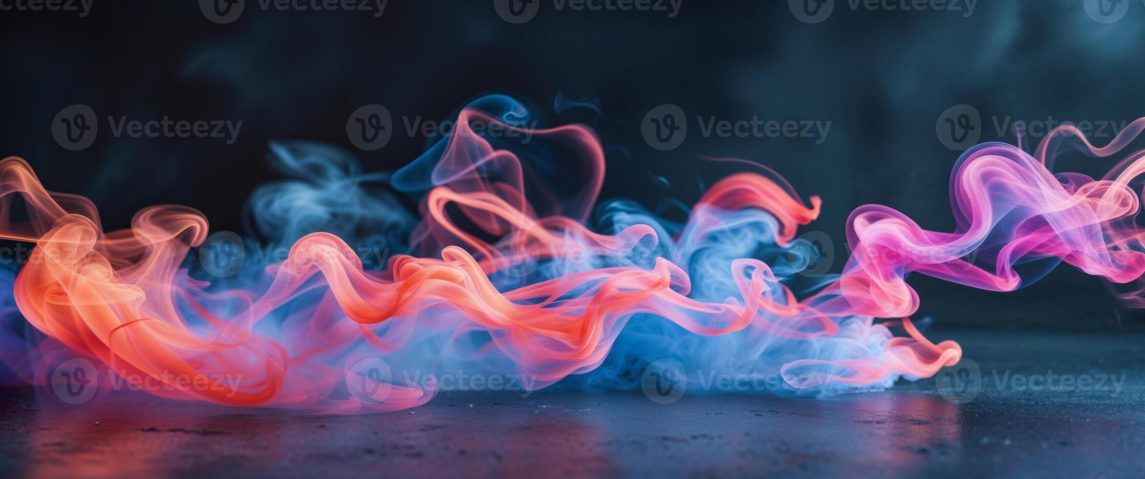 Colorful Smoke Swirls on Dark Background. photo