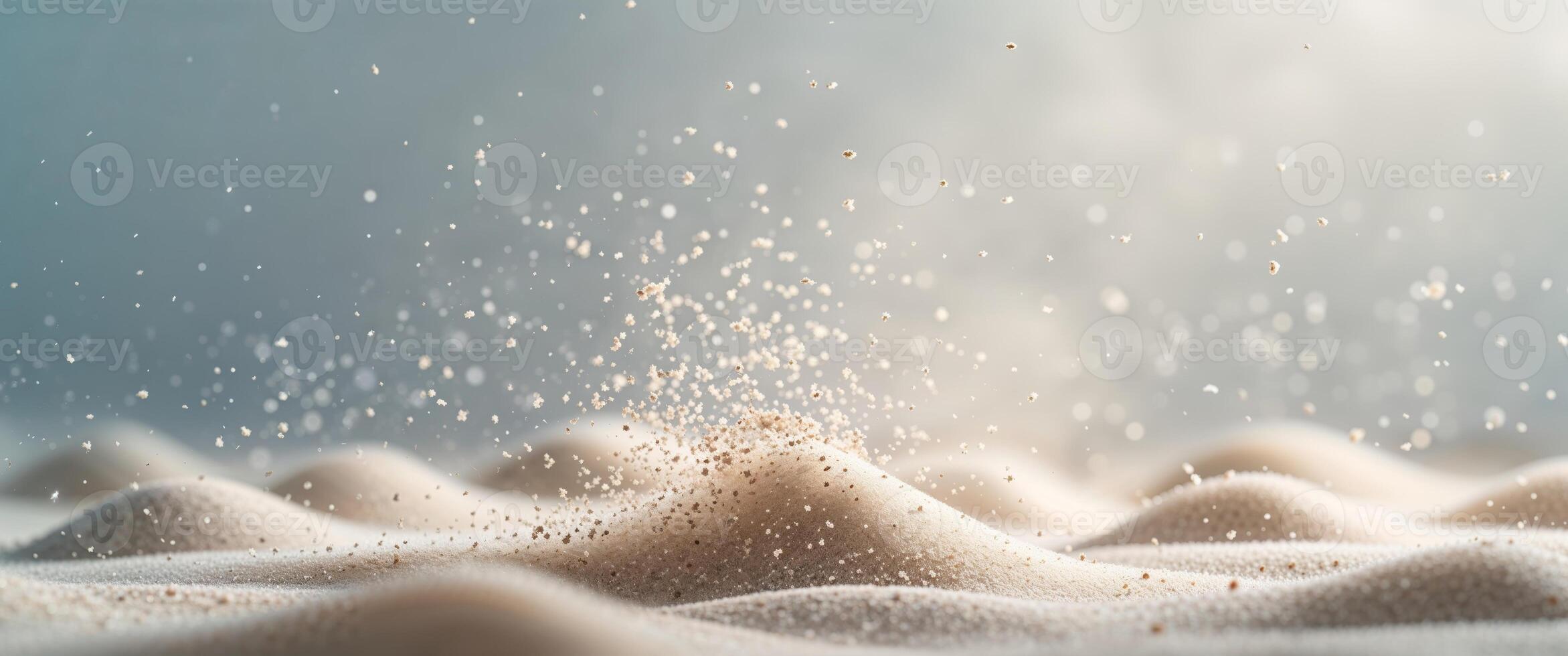Atmospheric scene of falling sand with dramatic lighting. photo