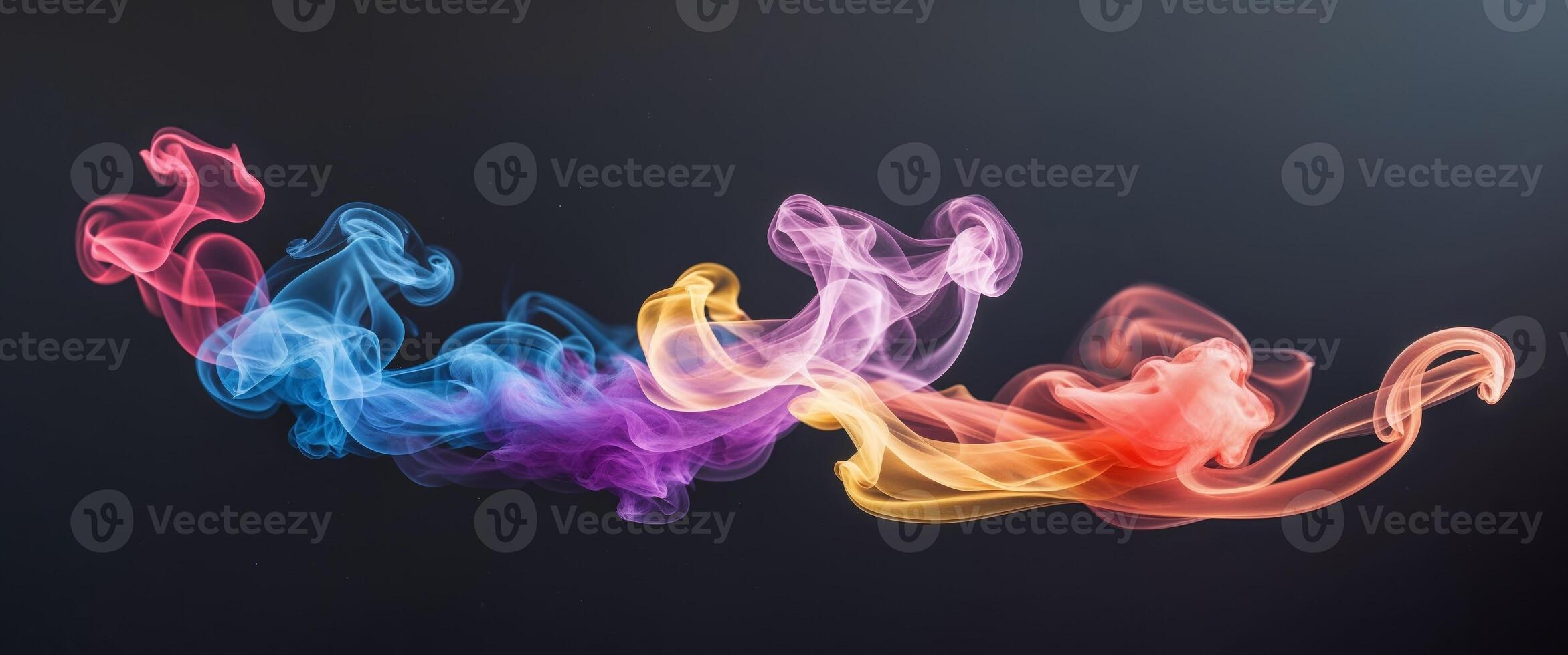 Colorful smoke on black background photo