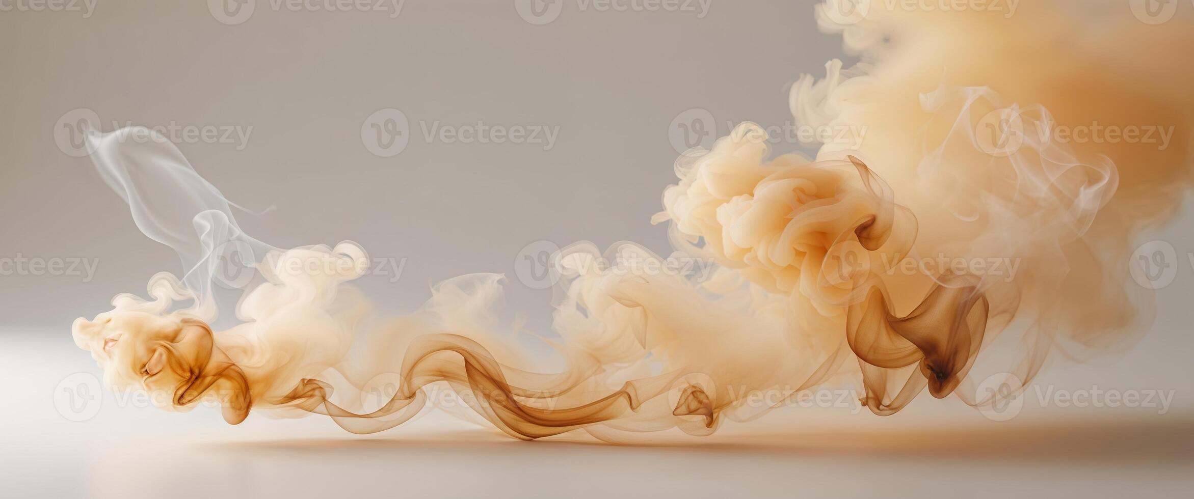 A smokey substance is being blown into the air photo