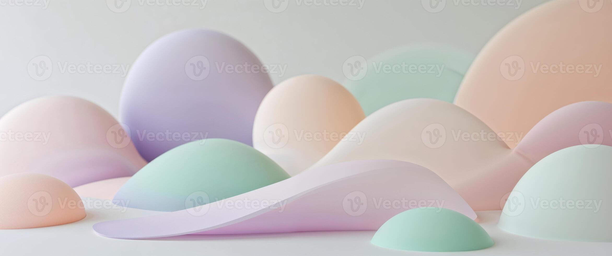 A group of colorful plastic spheres on a white surface photo